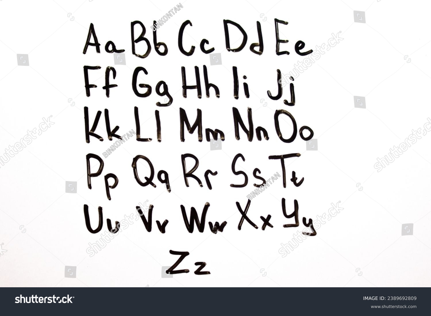 English alphabet, letters written with a marker on a blackboard. English alphabet, learning English, knowledge, education. #2389692809