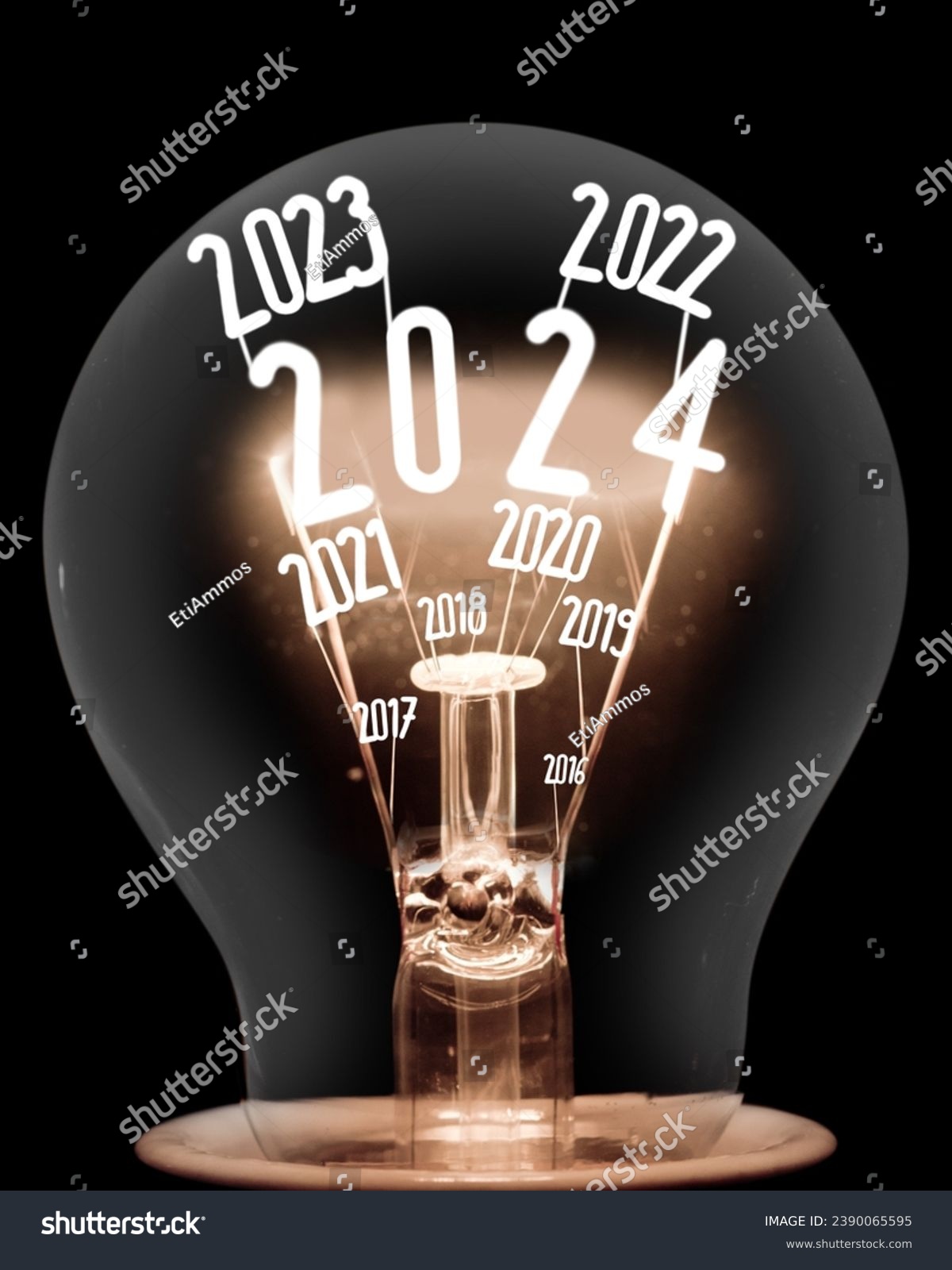 Single shining light bulb with fiber in a shape of New Year 2024 and years passed isolated on black background. #2390065595