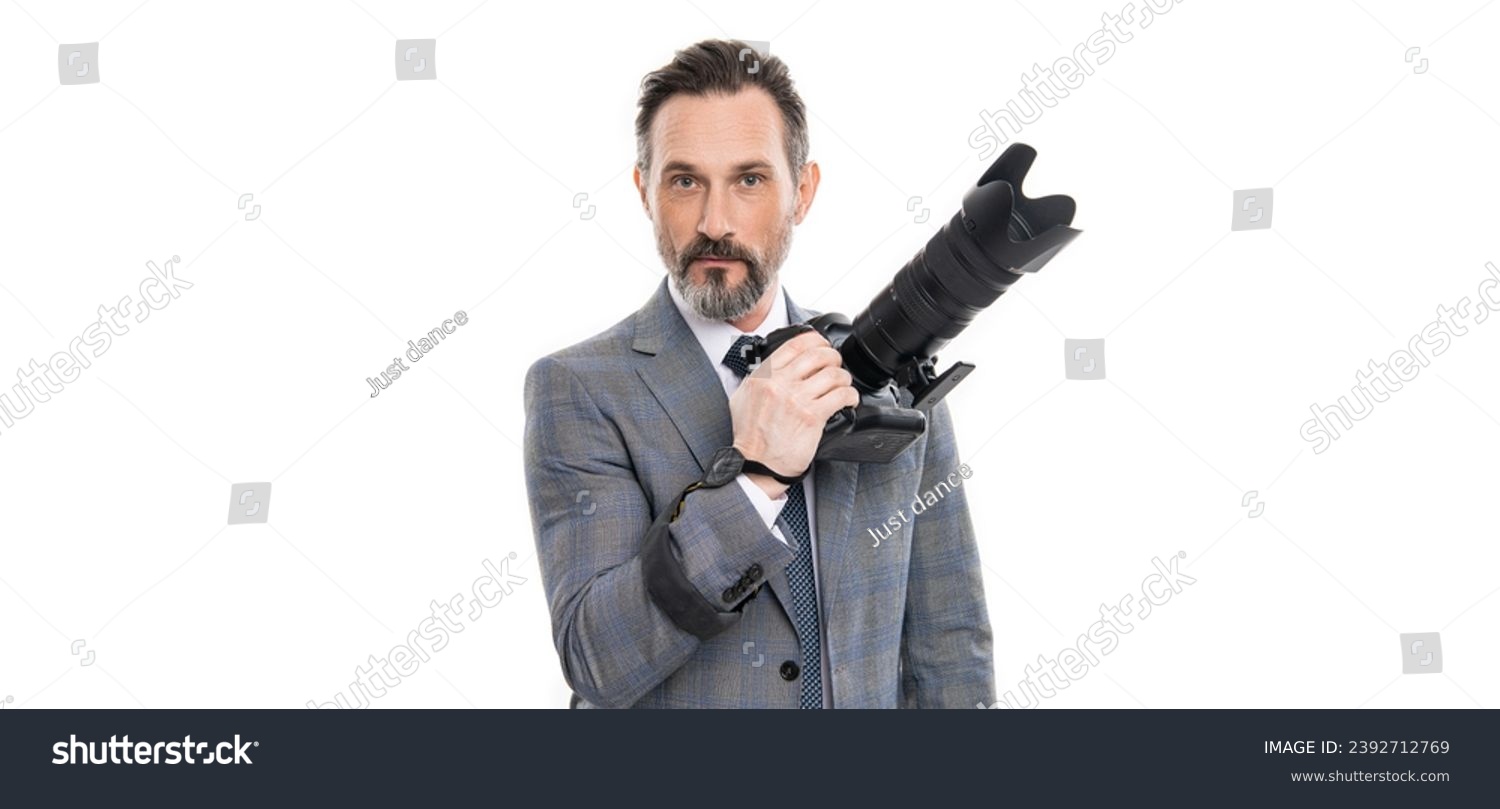 photojournalist in business suit. business photographer with camera. journalist man taking photo isolated on white. paparazzi photographer. businessman hold photo camera. freelance photographer #2392712769