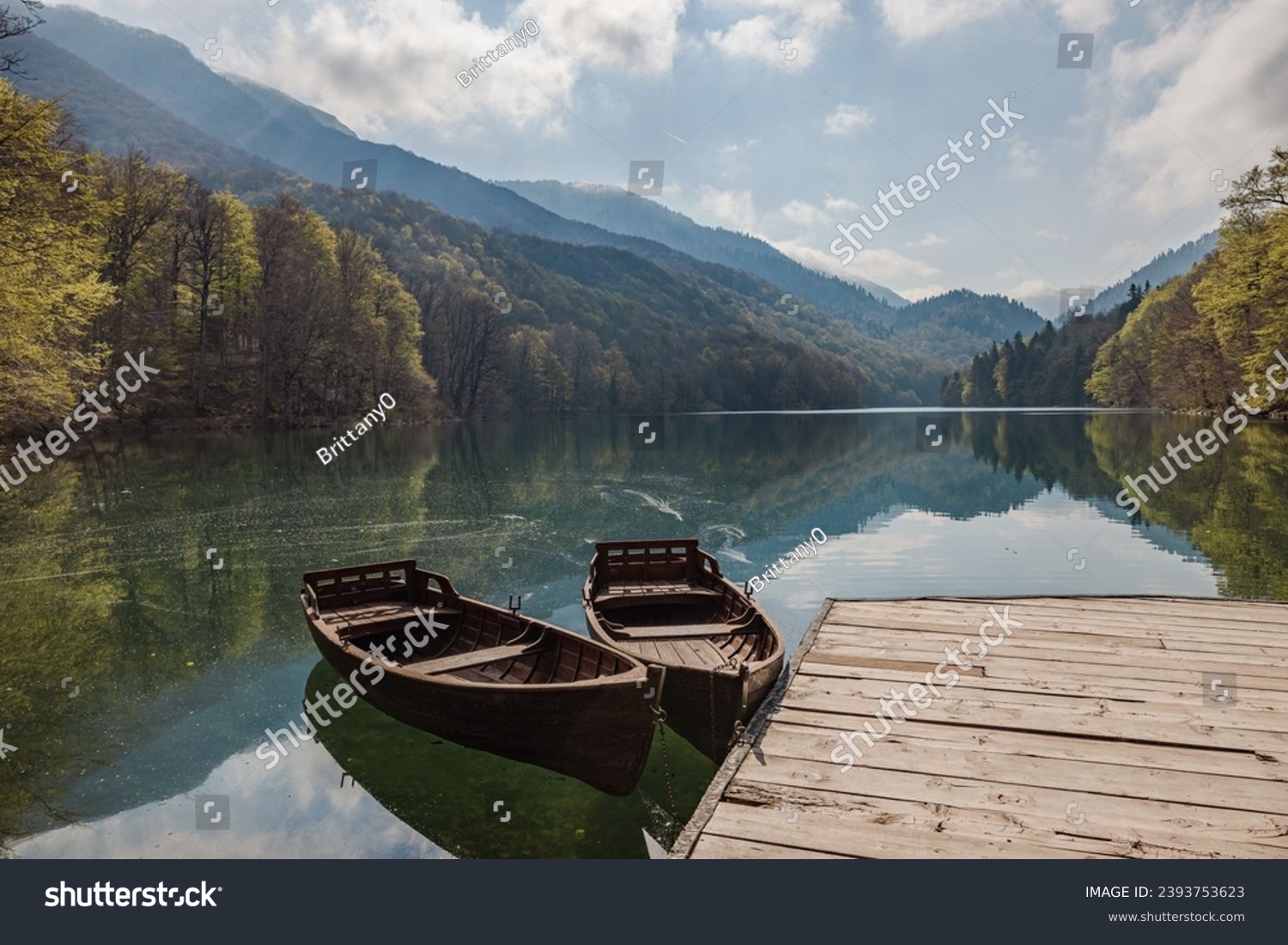 Boats on the clear water of Biogradasko Lake in Biogradaska Gora National Park in Montenegro #2393753623