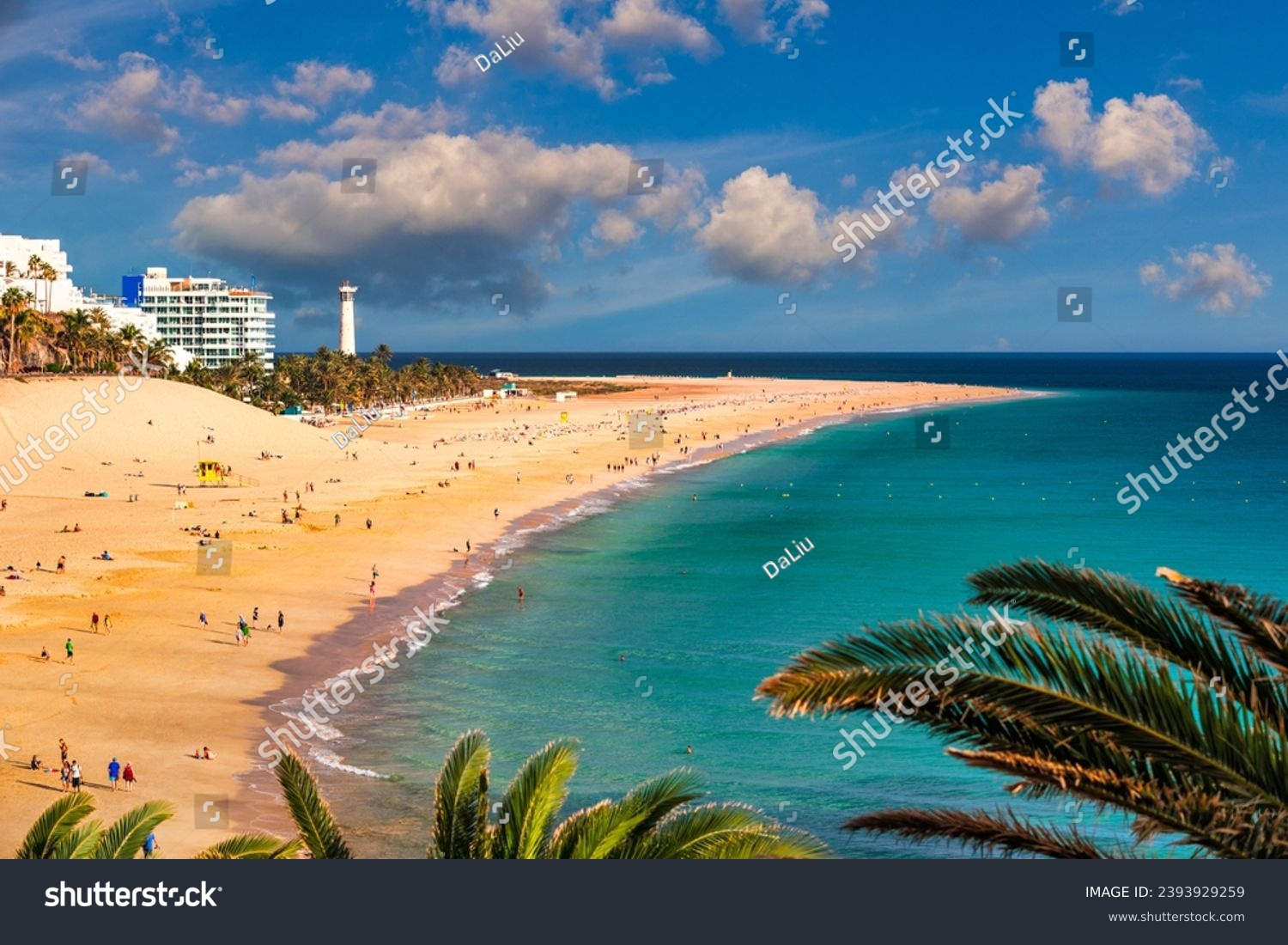 Morro Jable, Fuerteventura, Spain. Breathtaking beach Playa del Matorral in the rays of the sunset. Morro Jable and Playa del Matorral, Fuerteventura, Canary Islands, Spain, Atlantic, Europe #2393929259