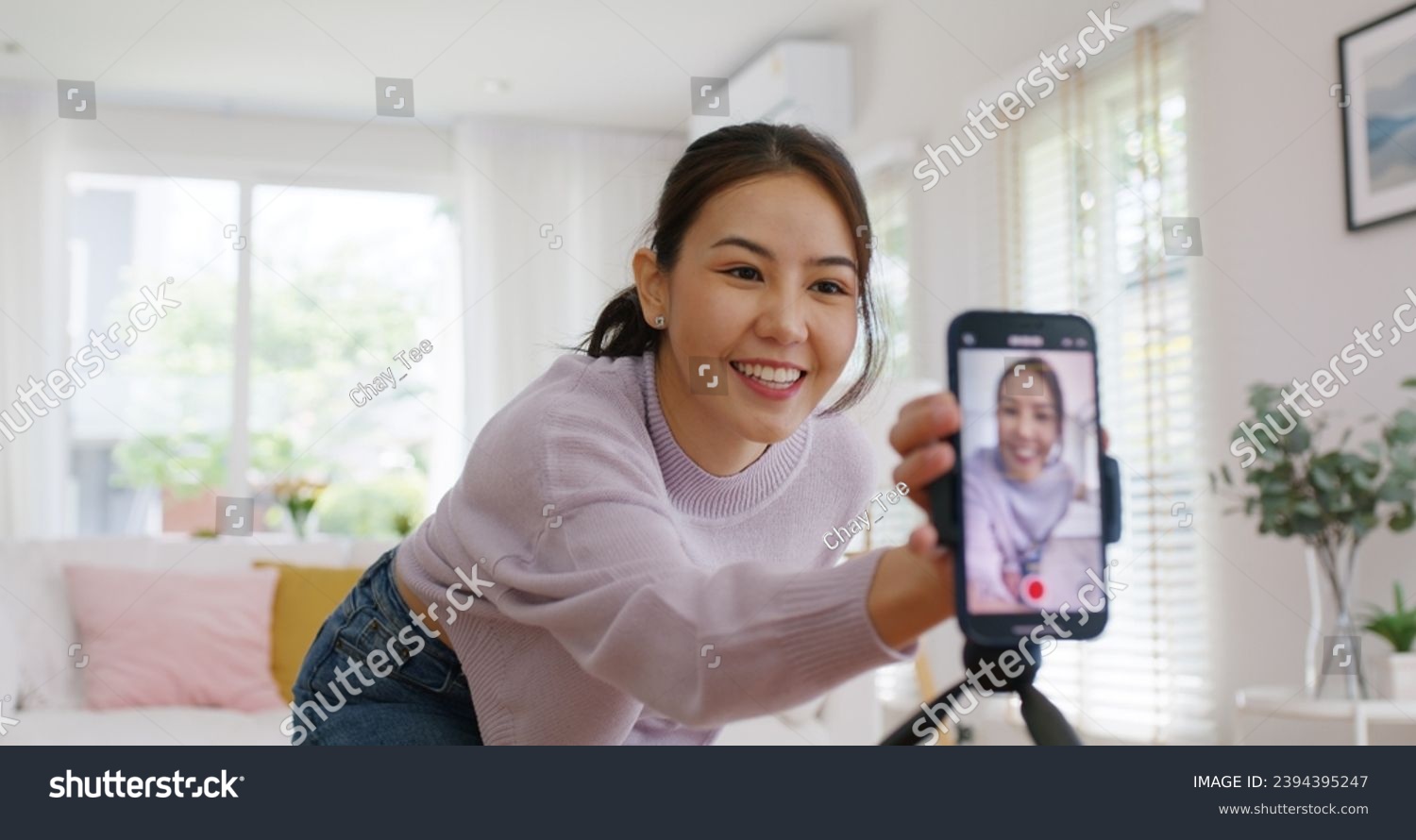 Asia vlogger woman influencer smile enjoy hobby happy fun live online screen  reel  at home Gen Z teen girl talent people play video selfie camera shoot  app show share viral story #2394395247