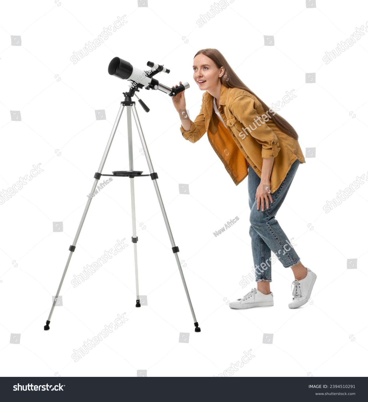 Young astronomer looking at stars through telescope on white background #2394510291