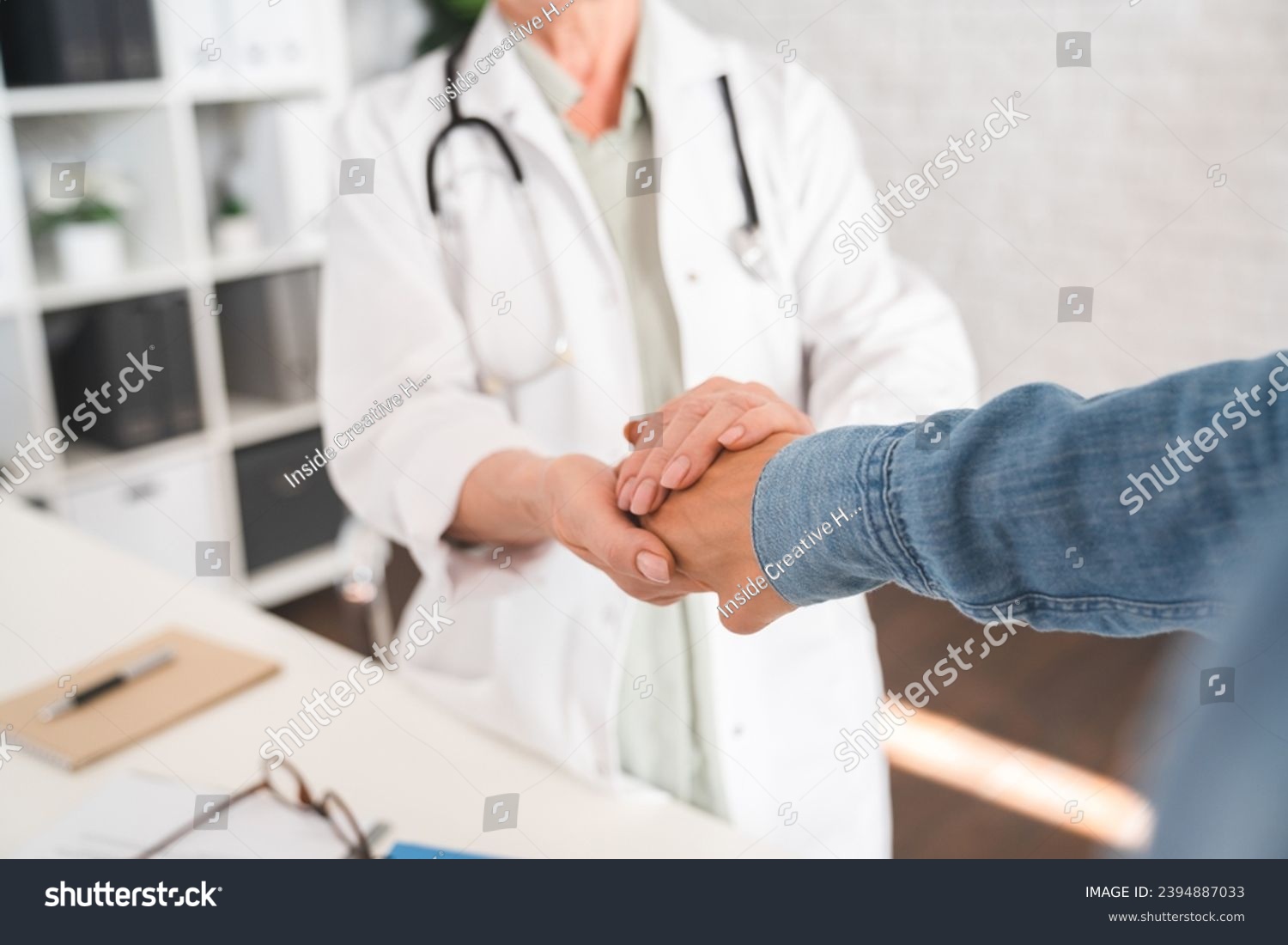 Care and patients. Doctor touching patient`s hand. Recuperation and healing process. Psychotherapy and diagnosis. Cancer treatment. Support and hope #2394887033