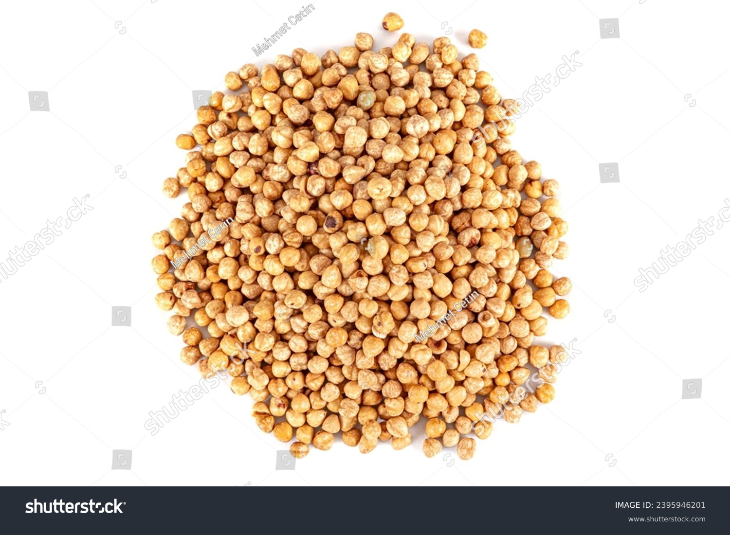 Pile of roasted nuts on white background. Hazelnuts harvest. Filbert photo wallpaper. Full frame of hazel. Peeled brown nut kernels. Healthy organic bio products. Vegetarian, vegan and raw food. #2395946201