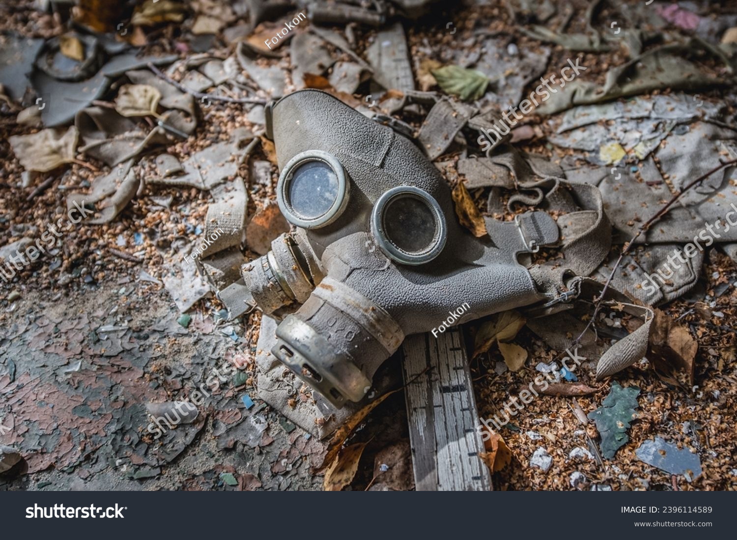 Gas mask in school in Illinci abandoned village in Chernobyl Exclusion Zone, Ukraine #2396114589