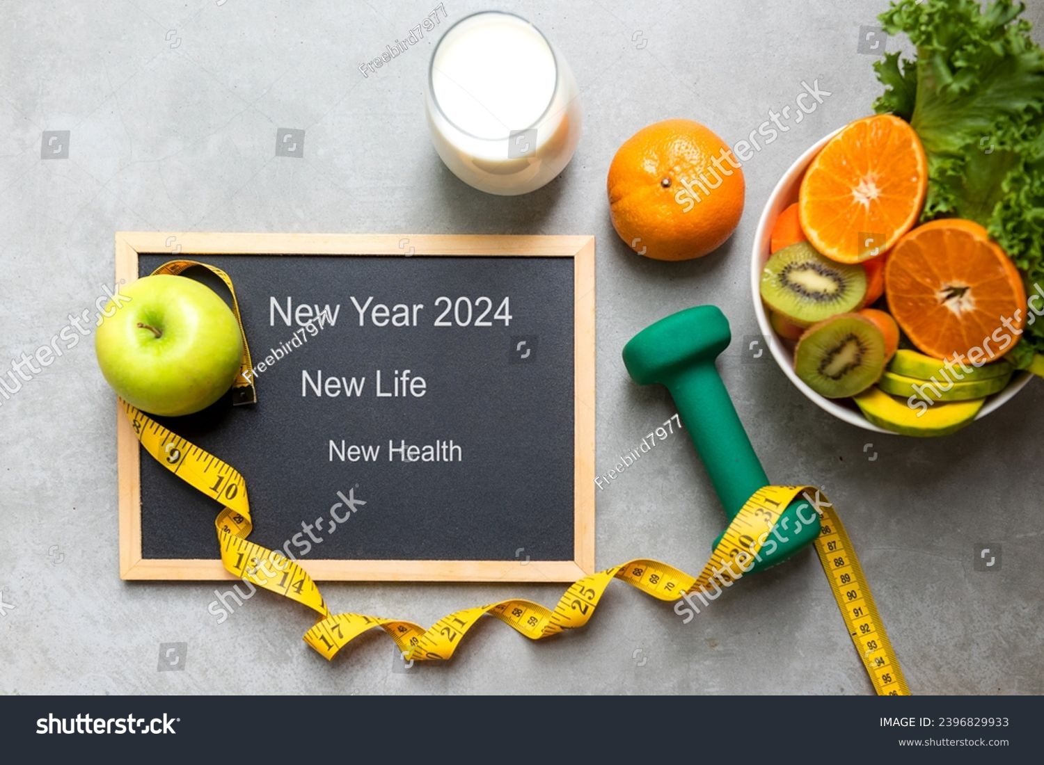 New Year for New Changes Healthy 2024.  Fresh vegetable fruits and healthy food for sport equipment for women diet slimming weight loss.  Healthy and Holiday Concept #2396829933
