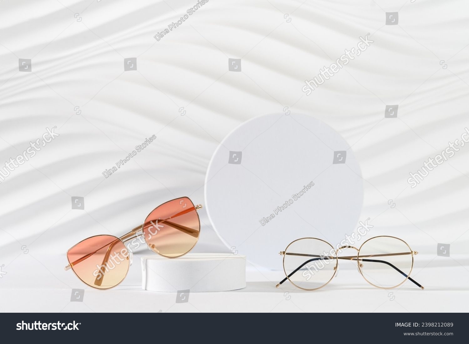 Sunglasses and glasses sale concept. Trendy sunglasses on podiums on a white background. Trendy Fashion summer accessories. Copy space. Promotion, sale. Optic store discount poster. Minimal #2398212089