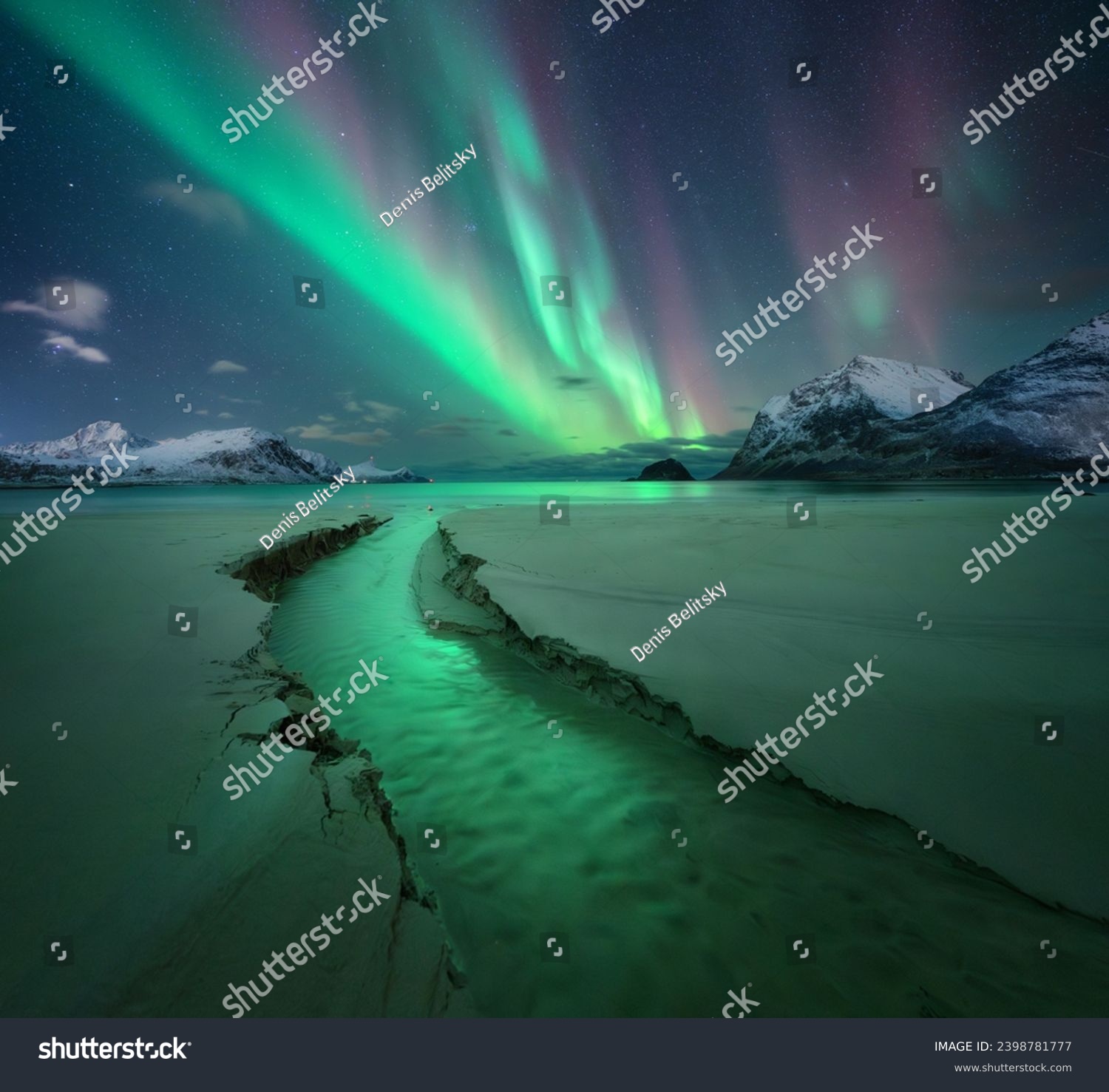 Northern Lights, snowy mountains, sandy beach, creek at starry winter night. Lofoten islands, Norway. Amazing Aurora borealis. Sky with polar lights. Landscape with aurora, sea, stream, rocks in snow #2398781777