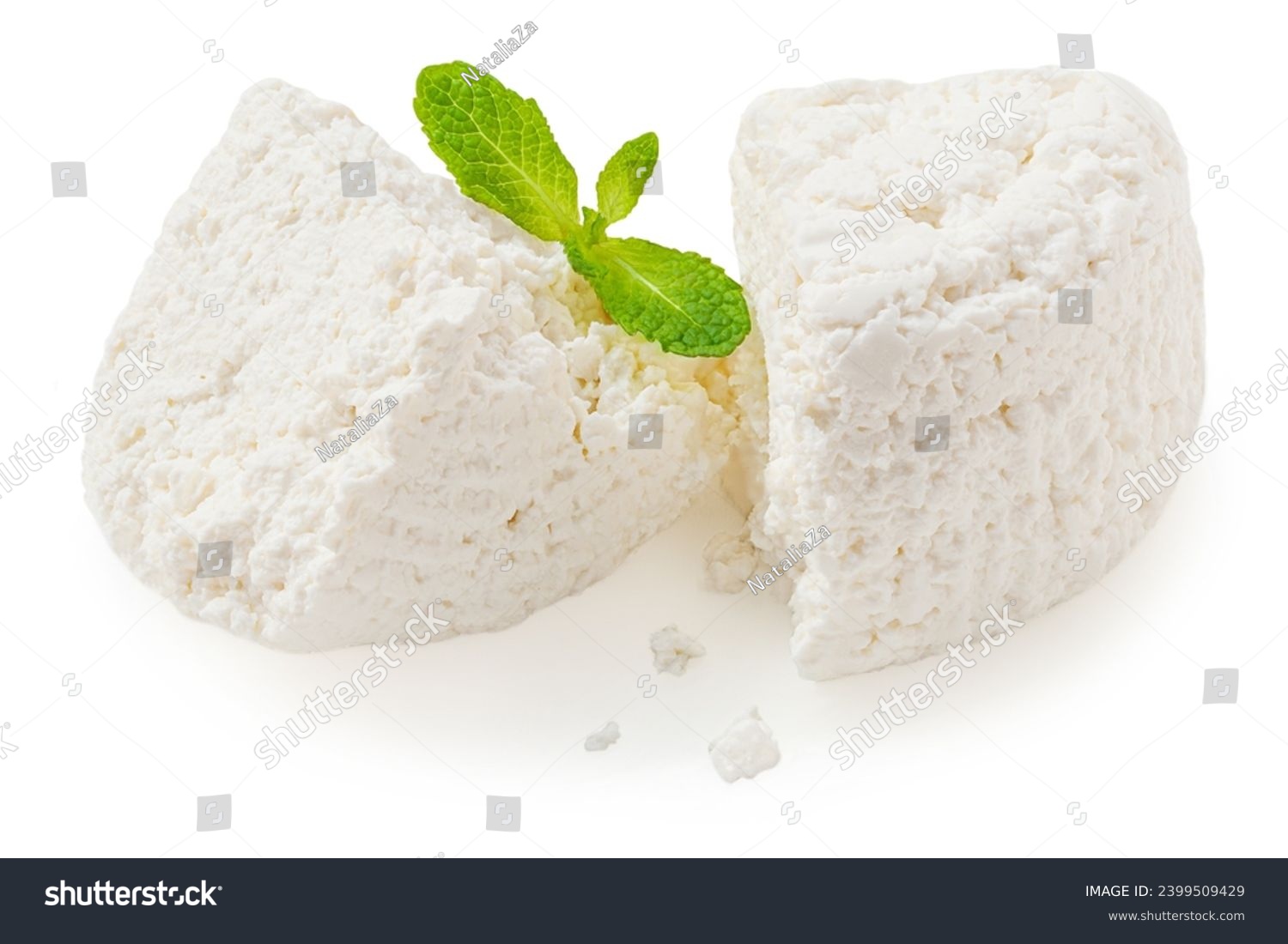Cottage cheese isolated on white background closeup. Fresh grainy cottage cheese or feta with mint leaf close up #2399509429