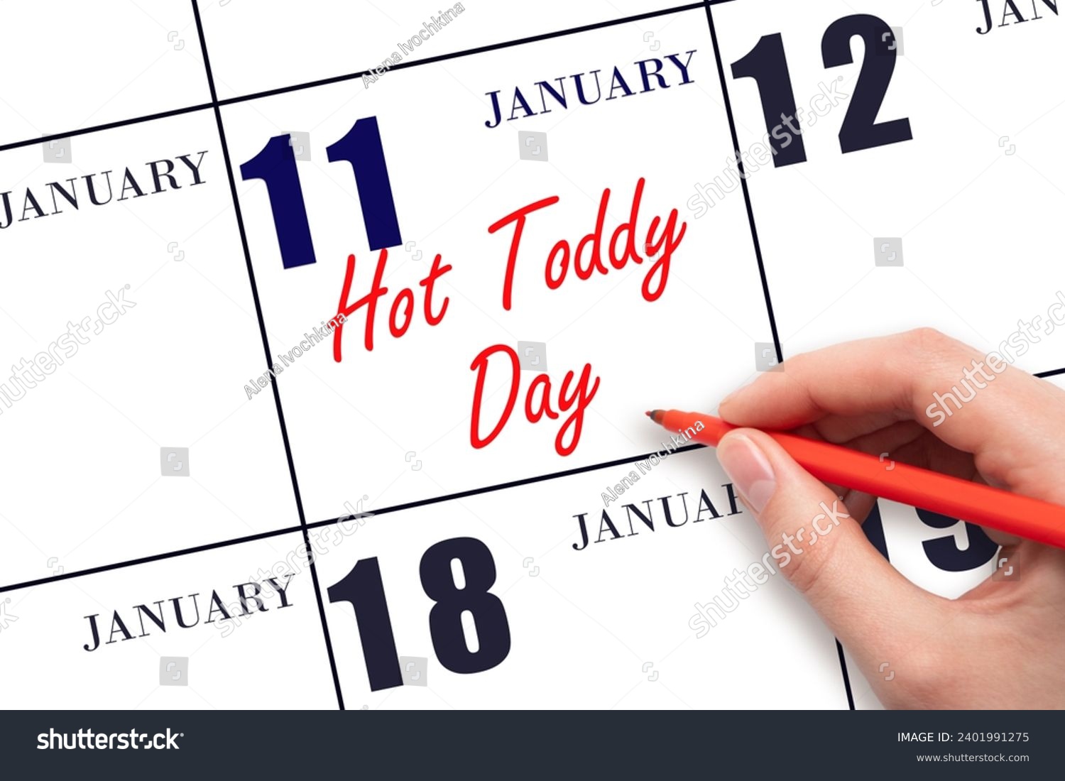 January 11. Hand writing text Hot Toddy Day on calendar date. Save the date. Holiday.  Day of the year concept. #2401991275