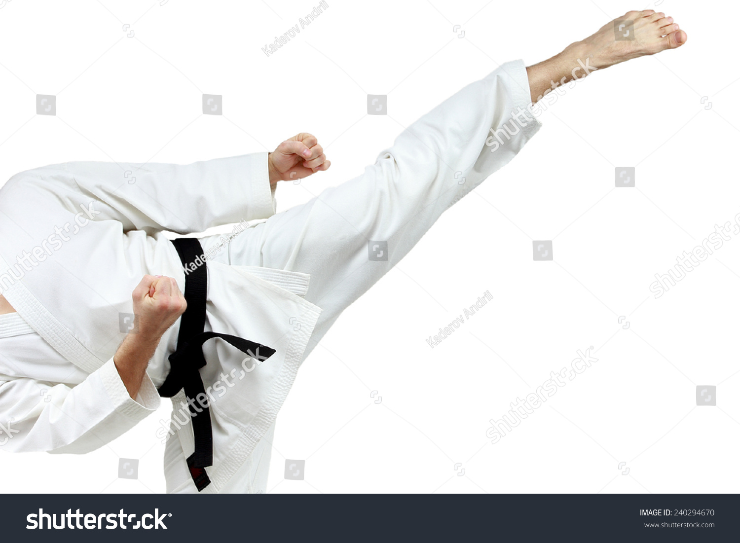 Mawashi geri kick is doing sportsman in a white karategi #240294670
