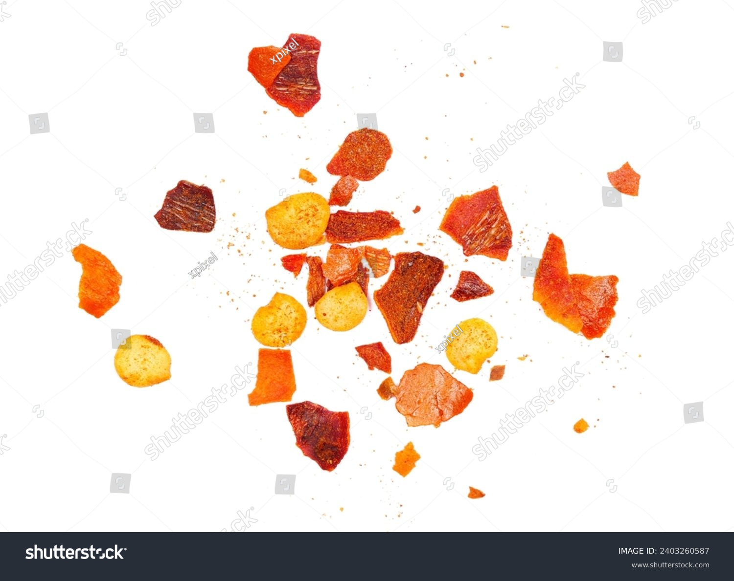 Close up spicy chili red pepper flakes, chopped, milled dry paprika pile isolated on white  #2403260587