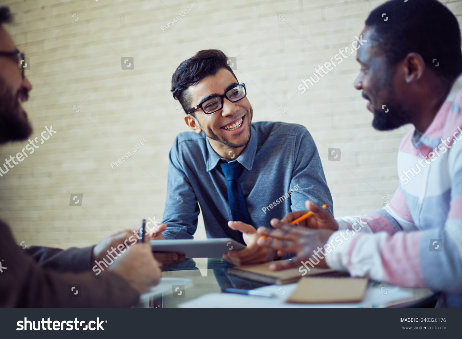 Group of modern managers speculating about working plans #240326176
