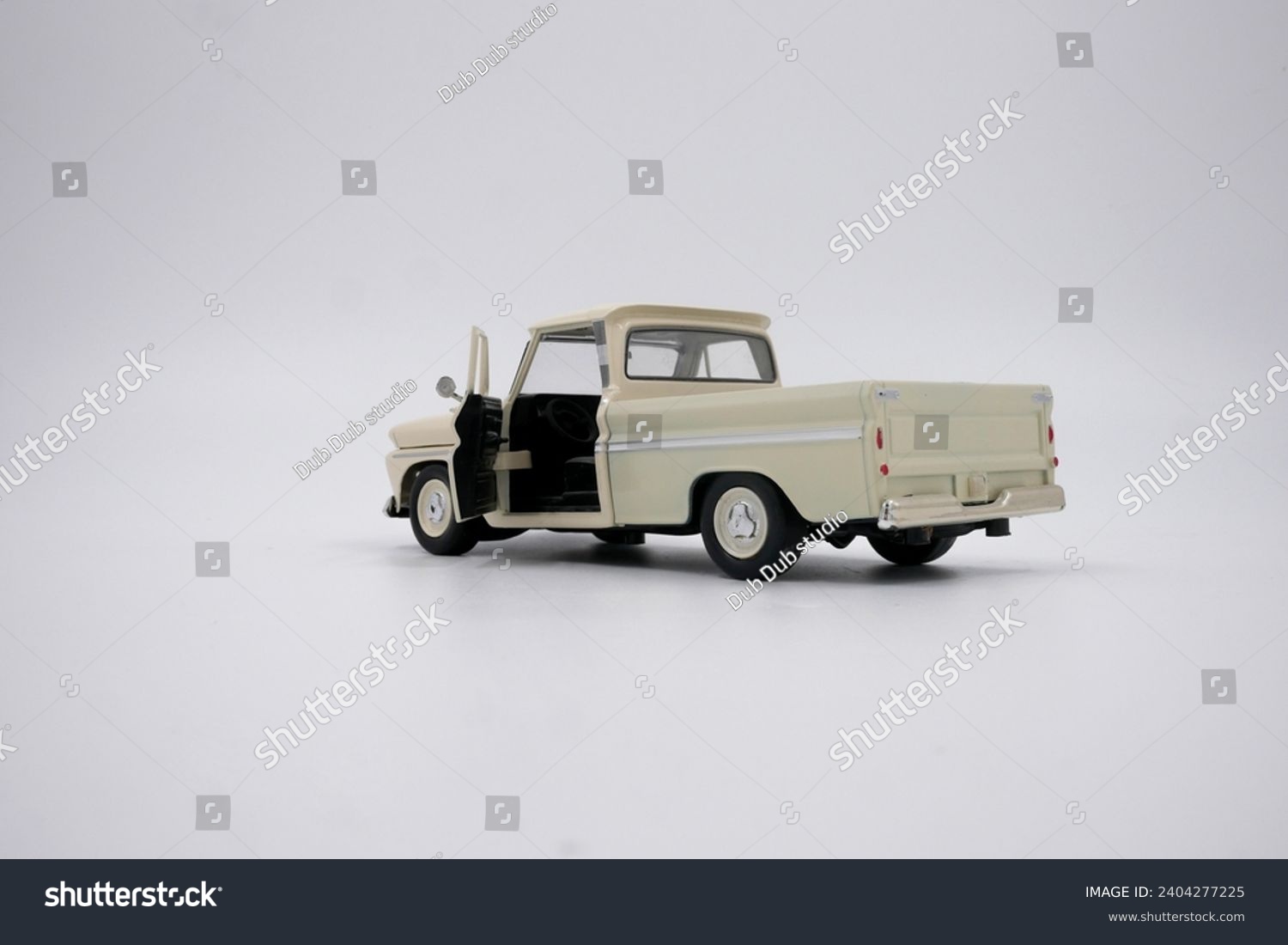 White Pick Up Truck. Vintage Pick Up Truck. Isolated on white. Room for text. Antique truck on white with shadows. #2404277225
