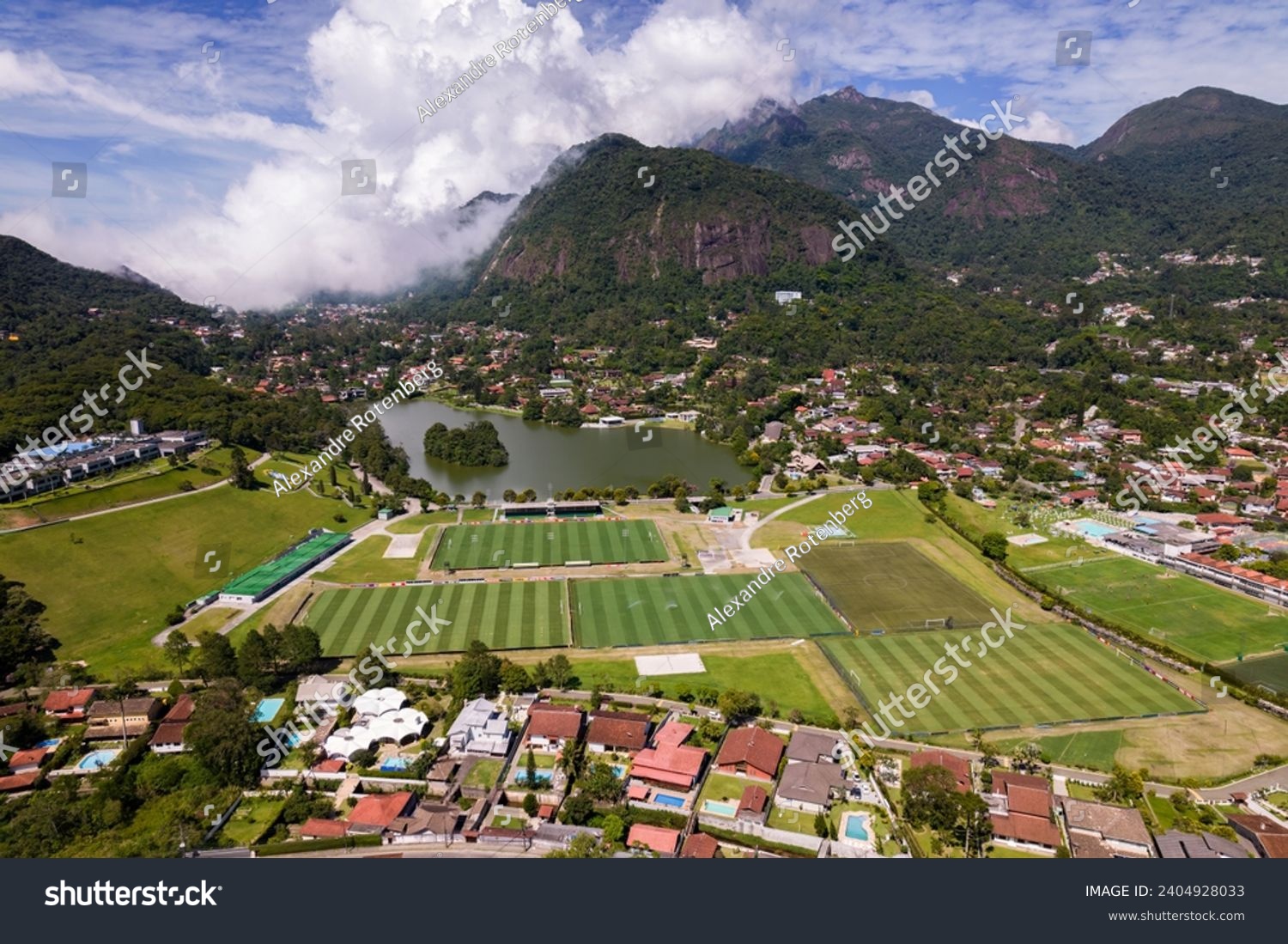 Aerial drone view of the city of Granja Comary in Teresopolis, the headquarters and main training center of the Brazil national football team #2404928033