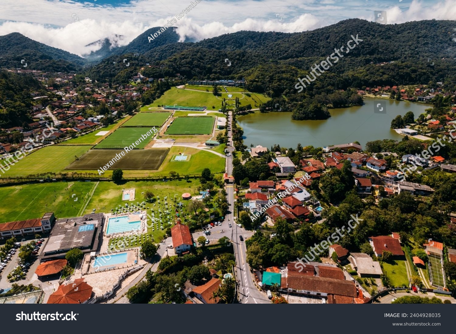 Aerial drone view of the city of Granja Comary in Teresopolis, the headquarters and main training center of the Brazil national football team #2404928035