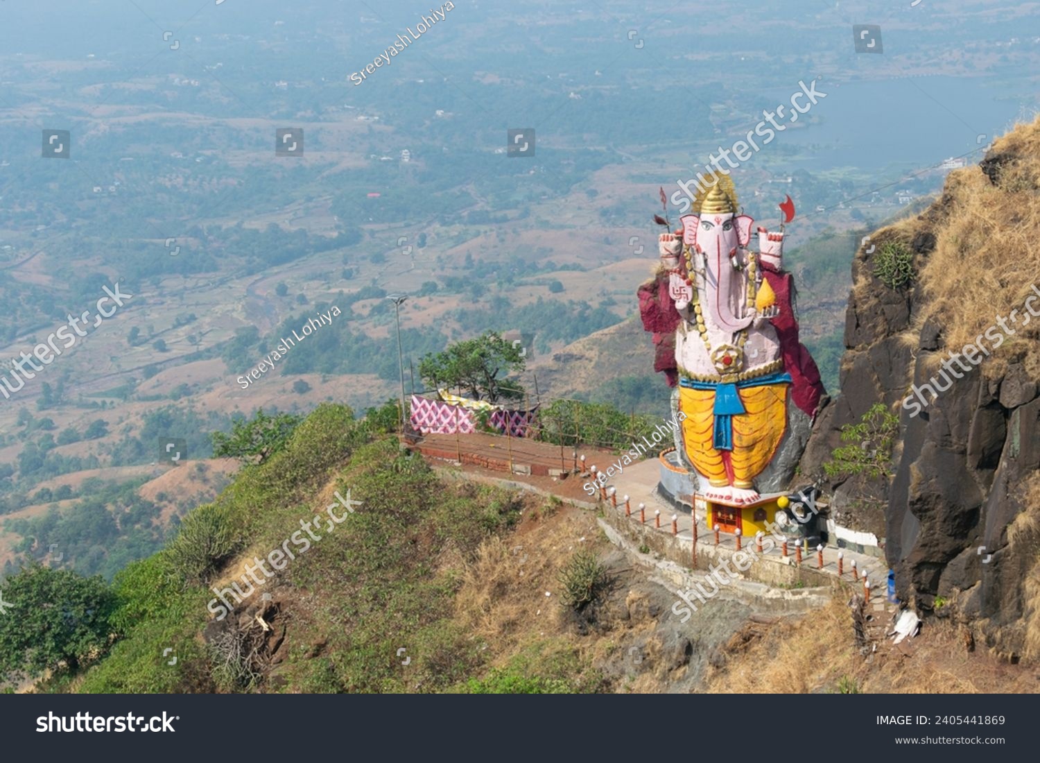 Lord Ganesha's Idol 
made of rock near Matheran, Maharashtra. Hinduism, sanatan, economics, India, Indian, Ganesh Chaturthi, pilgrimage, spiritual, religious, people, peace, nature, toy train, holiday #2405441869