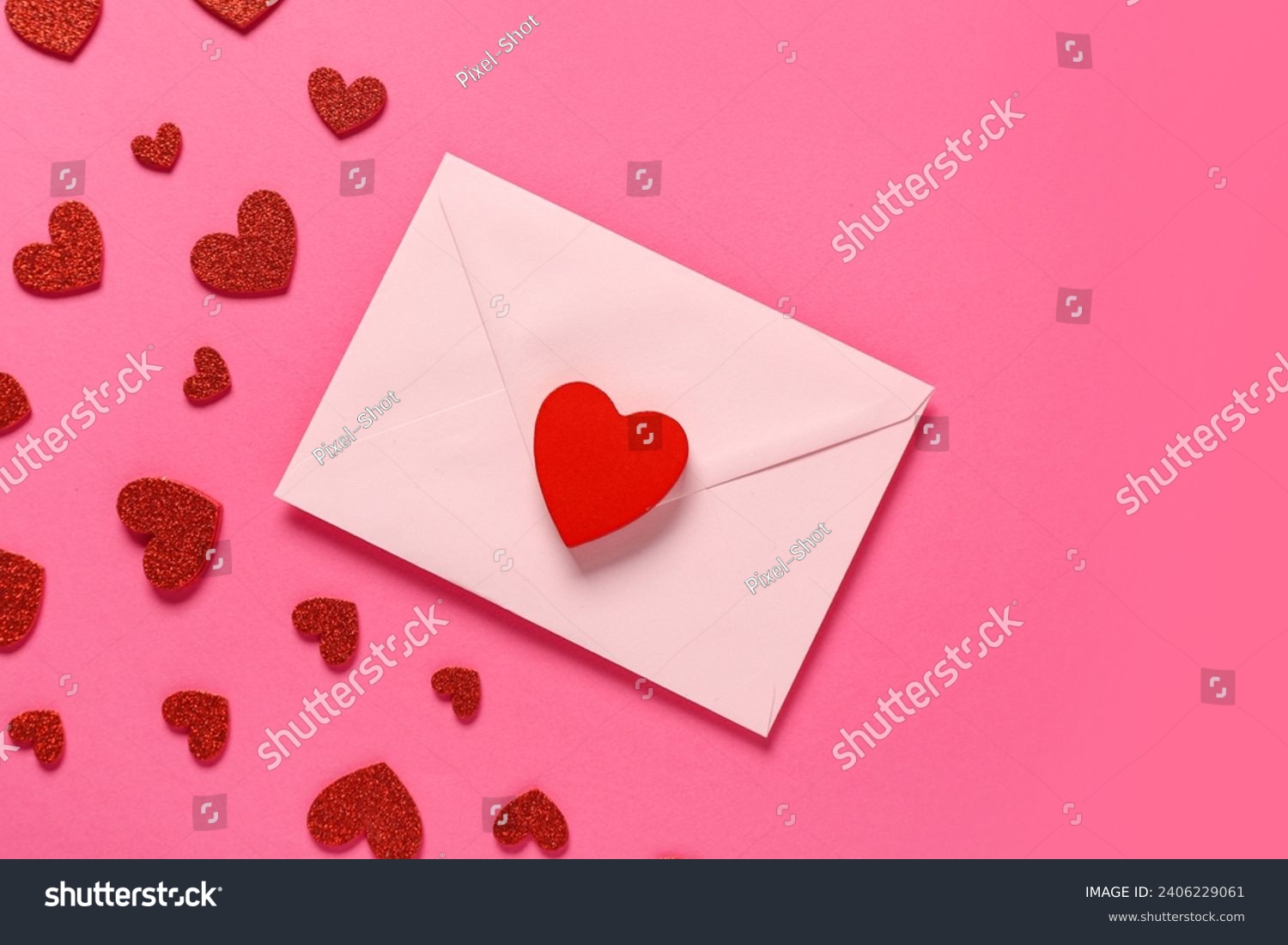 Composition with envelope and red hearts on pink background. Valentine's Day celebration #2406229061