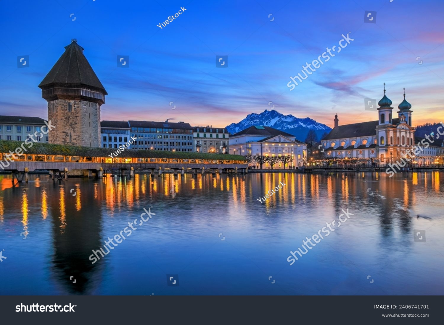 Luzern Kappelbrucke bridge and Jesuten church with Pilatus mountain at background in the evening view, Switzerland #2406741701