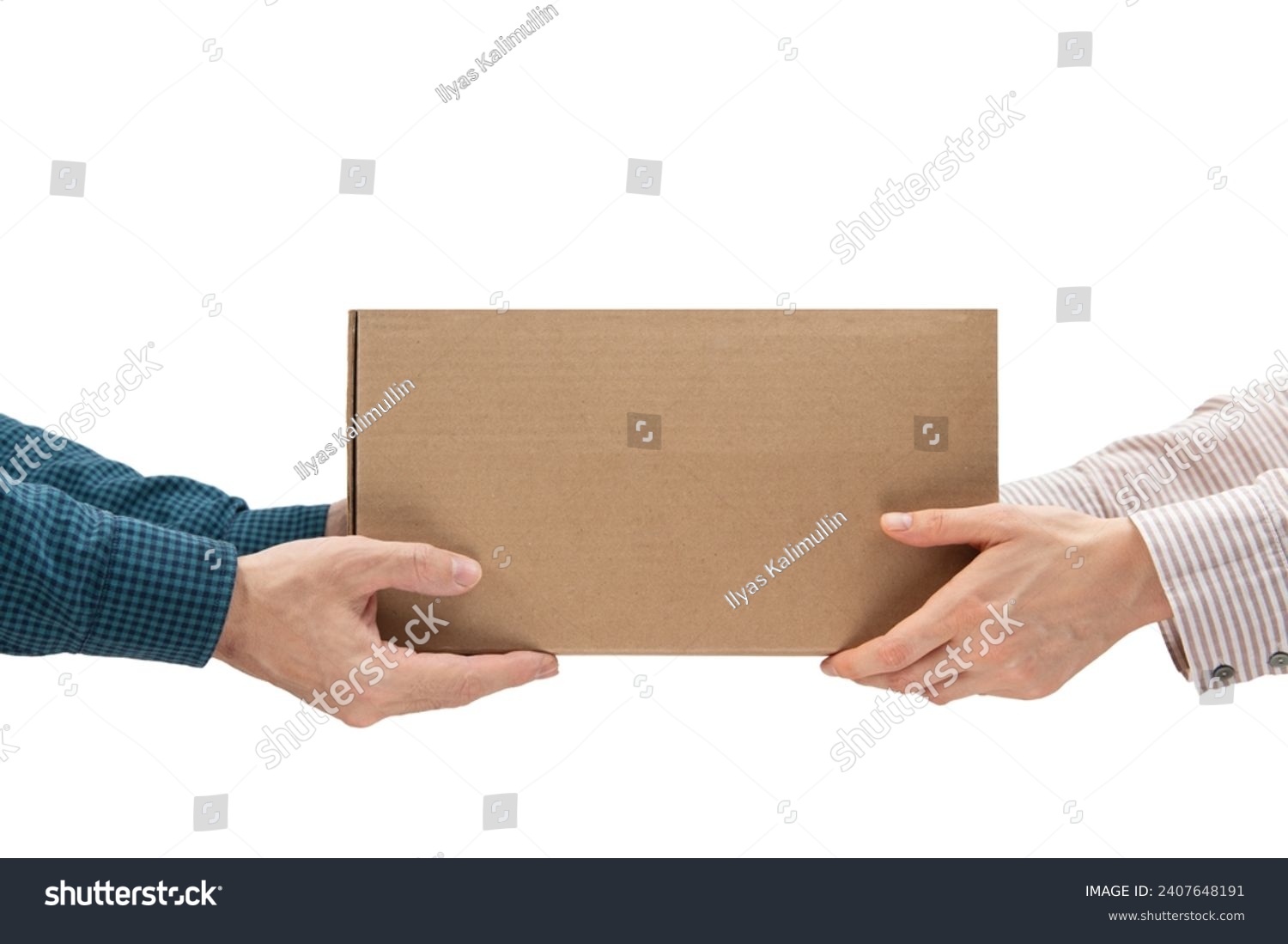 Male hands giving a package, female hands receiving a package. Purchase delivery concept #2407648191