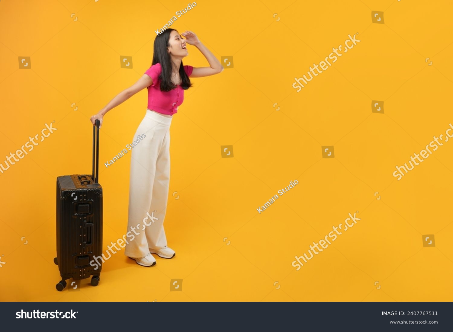 Full length of young asian woman wear summer casual clothes walk go with suitcase bag isolated on plain yellow background. Tourist travel abroad in free spare time rest getaway.  #2407767511