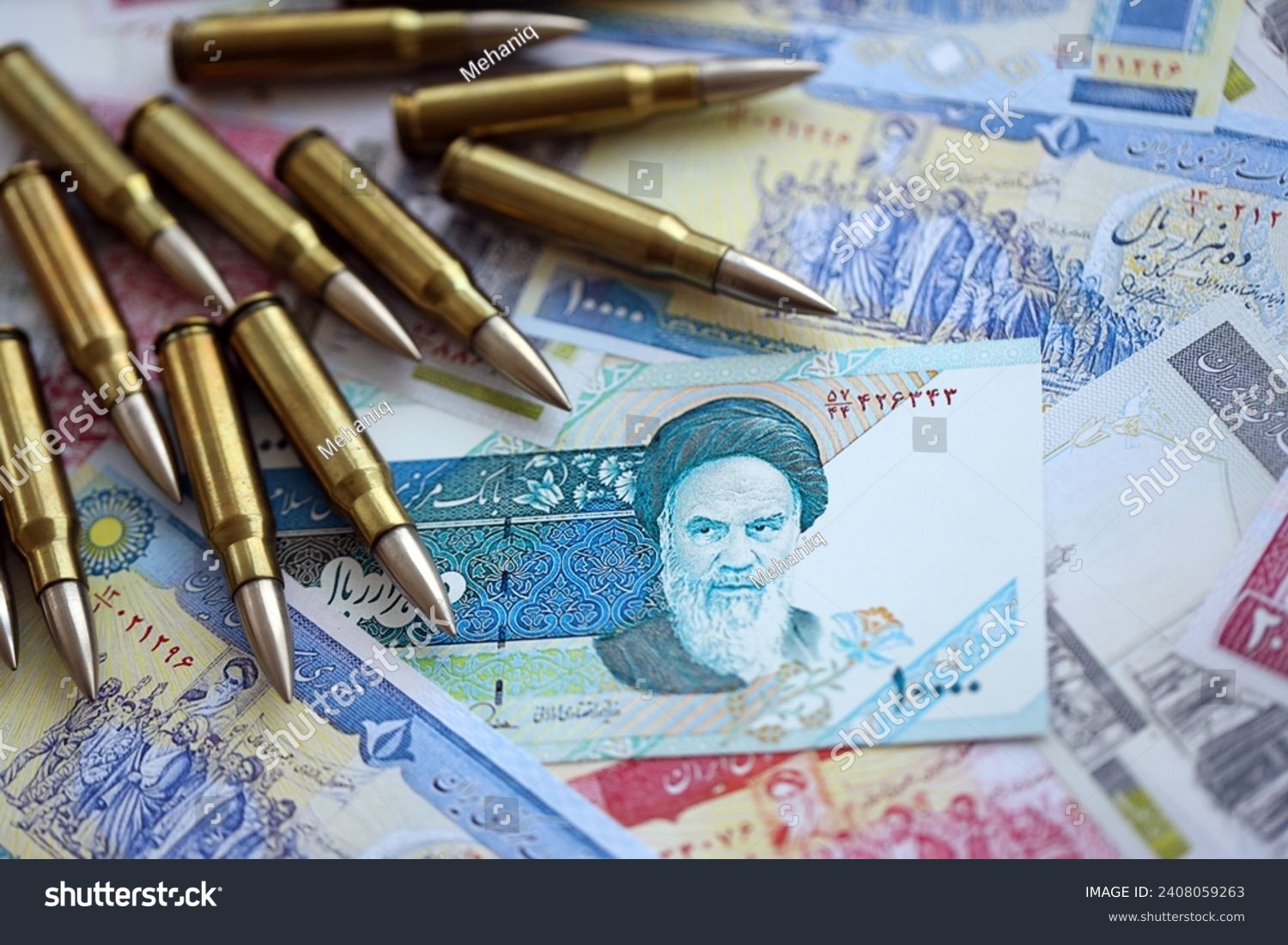 Many bullets and iranian rials money bills close up. Concept of terrorism funding or financial operations to support war in Iran #2408059263