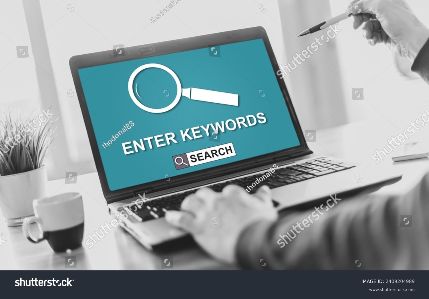 Laptop screen displaying a keywords search concept #2409204989