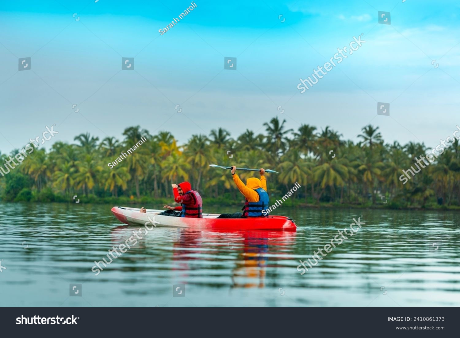 Kayaking in Kerala image, Travel guys kayaking and enjoying the nature view, Kerala travel and tourism concept background #2410861373