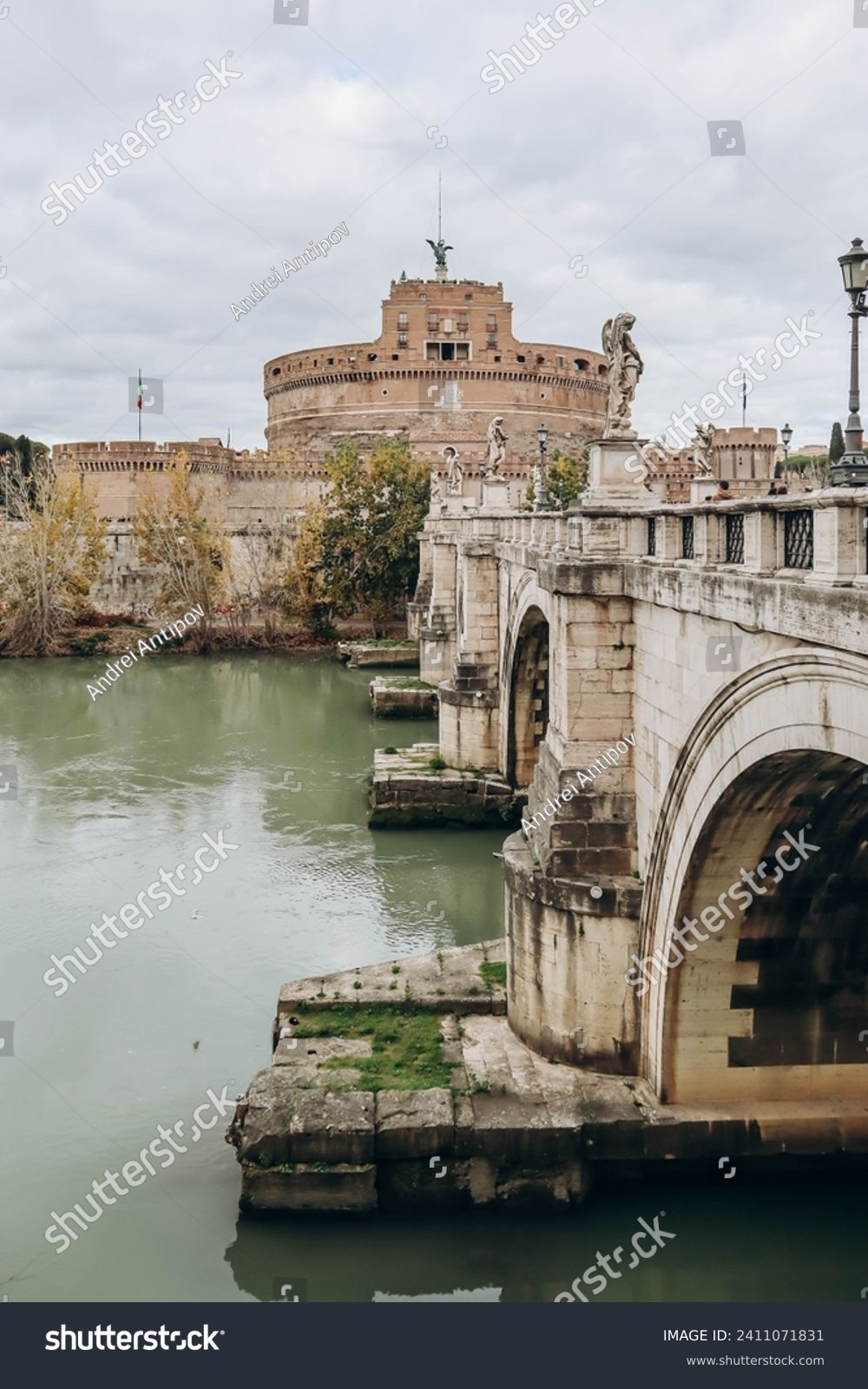 St. Angelo Bridge and Castel Sant'Angelo in Rome on a cloudy December day #2411071831