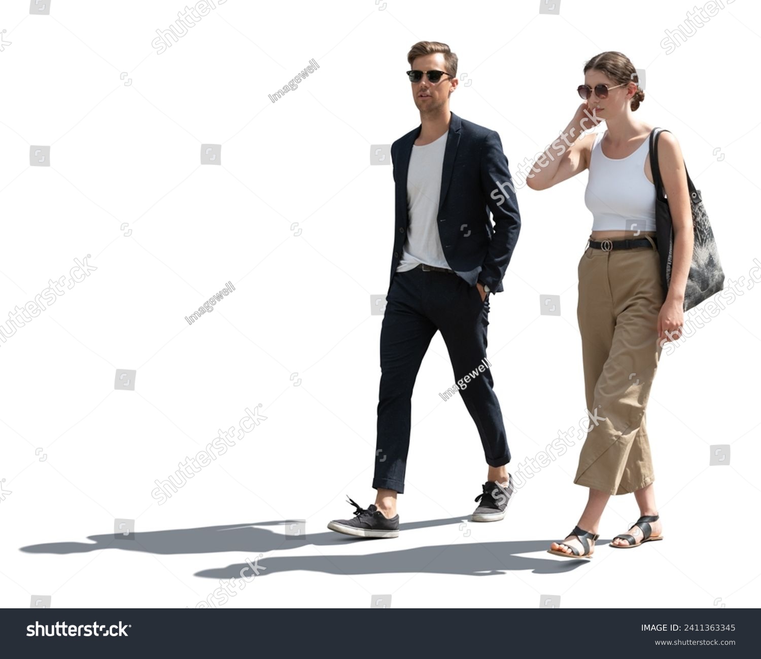Young fashionable couple walking in the street in summer isolated on white background #2411363345
