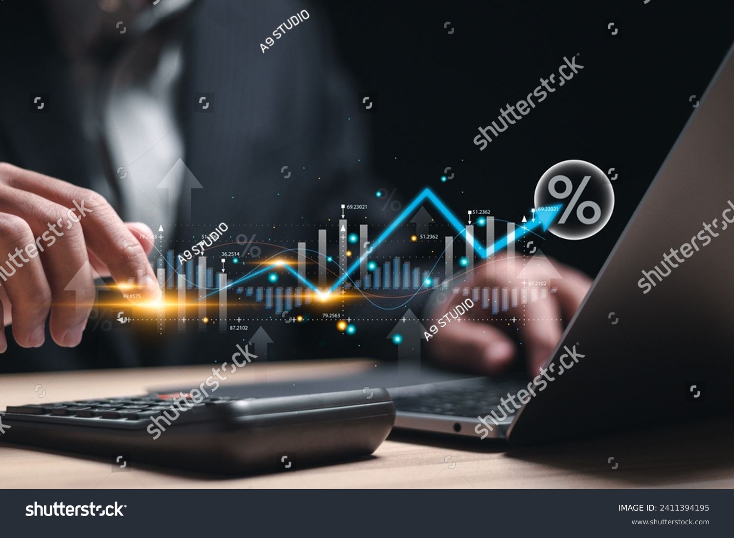 Interest rate and dividend concept, Businessman using laptop analyzing the economic growth graph for investment growth. business financial investment, business growth, income, marketing and profit. #2411394195