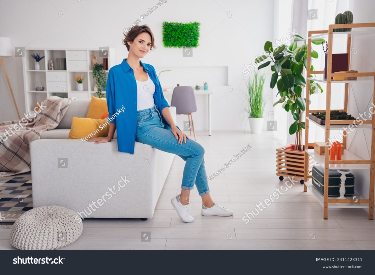 Full length profile portrait of adorable peaceful positive person sit sofa modern bright house indoors #2411423311