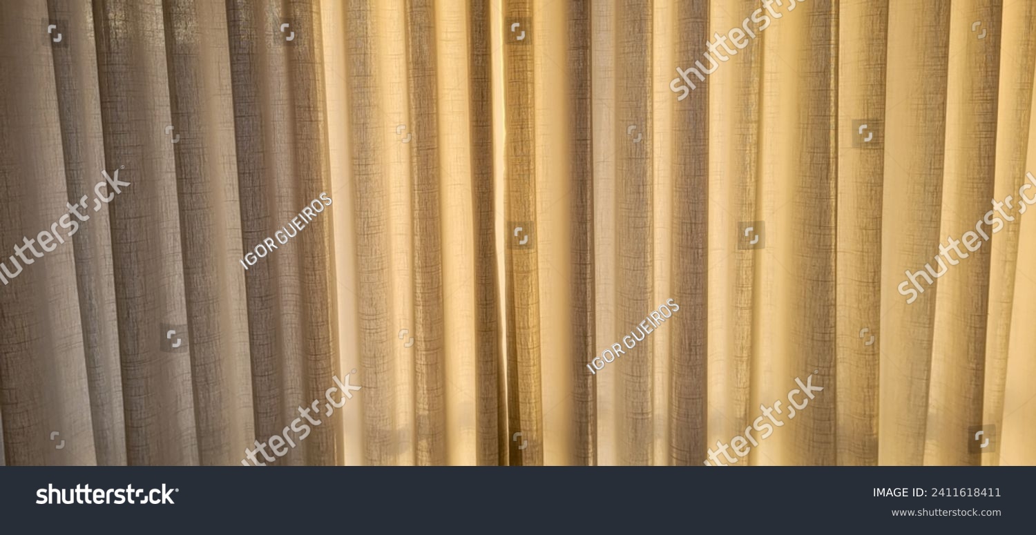 "Radiant and welcoming, this sunlit house curtain creates a warm and inviting atmosphere. Purchase this image and illuminate your projects with luminosity and comfort!" #2411618411