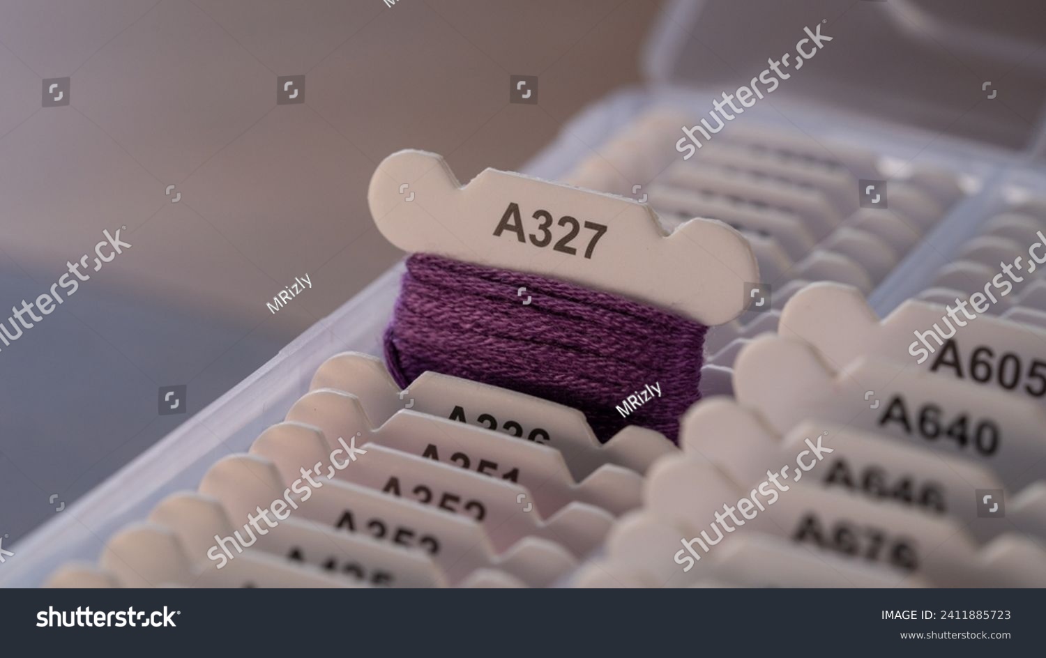 Purple Floss Bobbin with Thread in a Box #2411885723