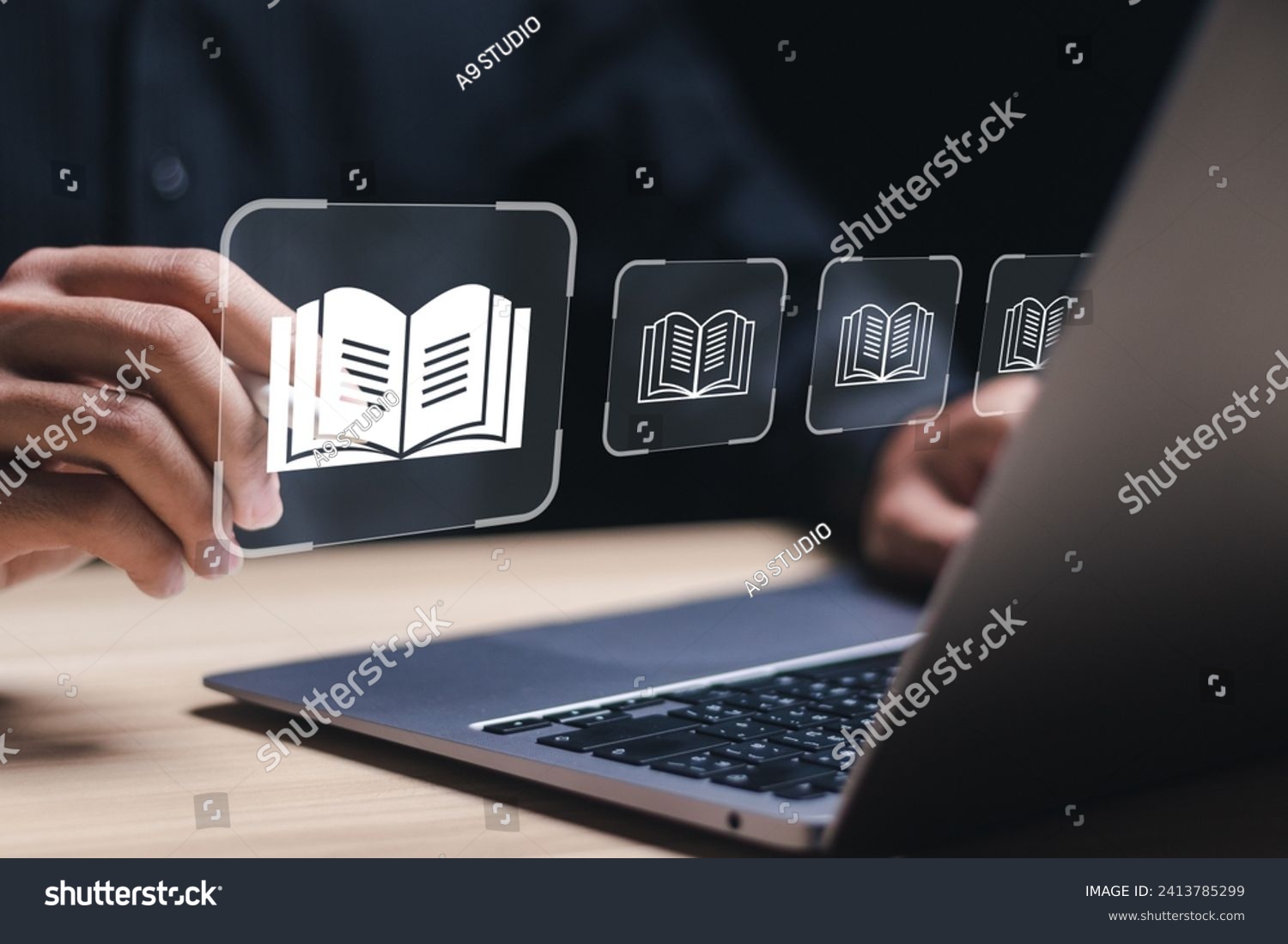 E-library concept. Person use laptop with virtual E-book icons for electronic books online, knowledge base on internet, digital library or e-library. #2413785299