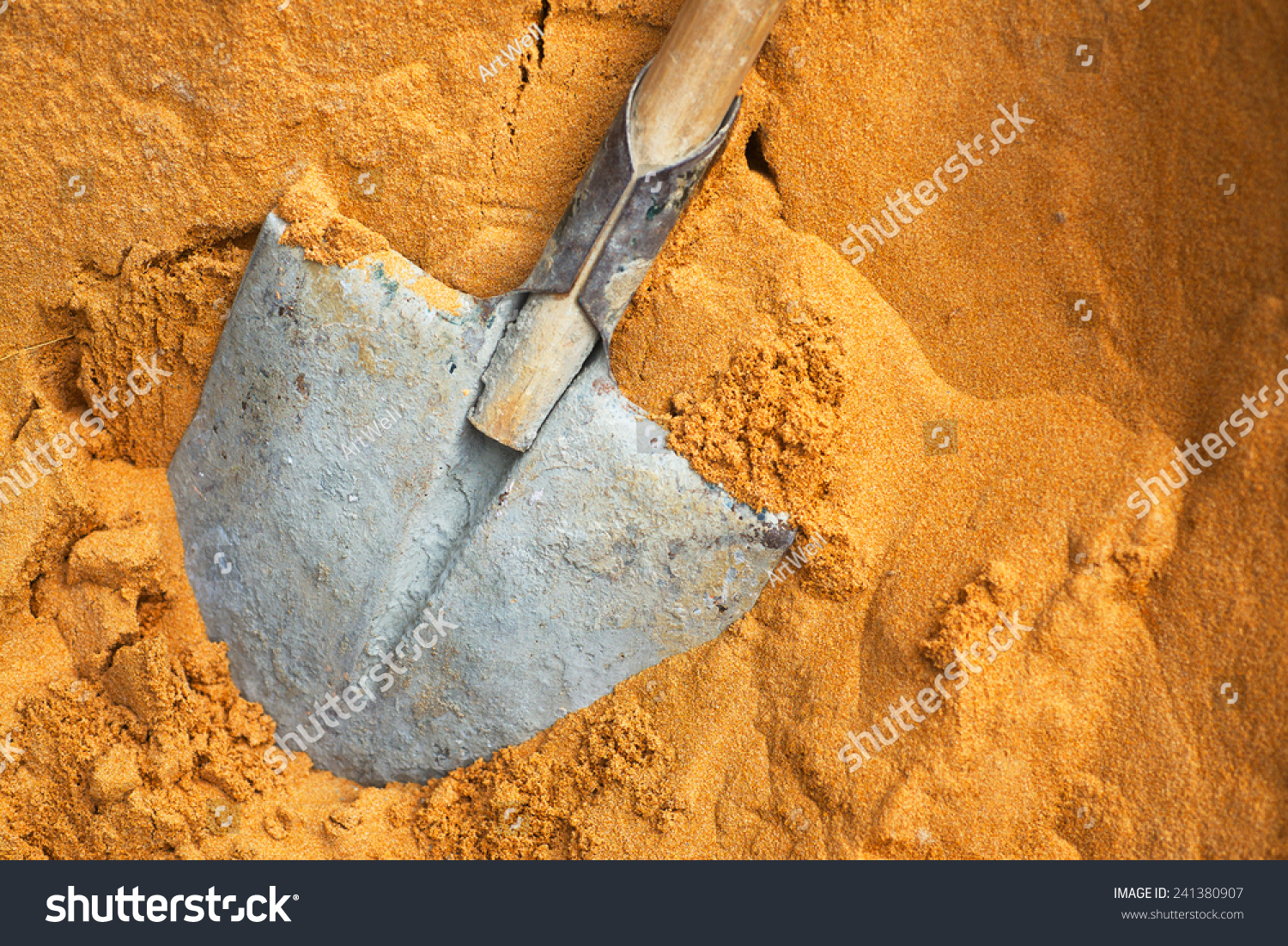 Building a shovel in sand on construction #241380907