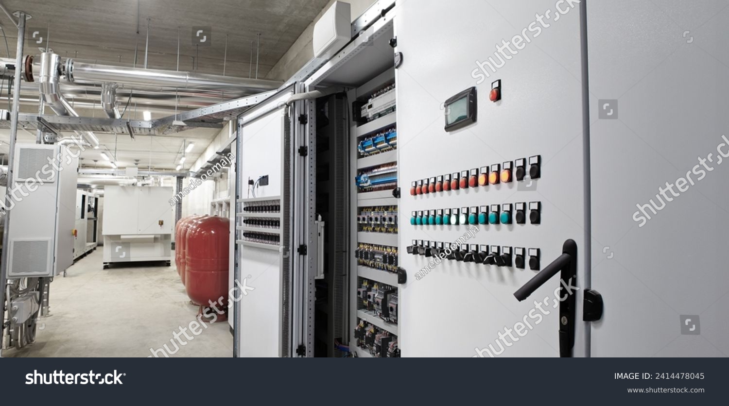 Electrical panel cabinet for HVAC system control, managing heating, ventilation, air conditioning, and cooling. Climate control system, including the boiler room, ensures comfort of the rooms building #2414478045