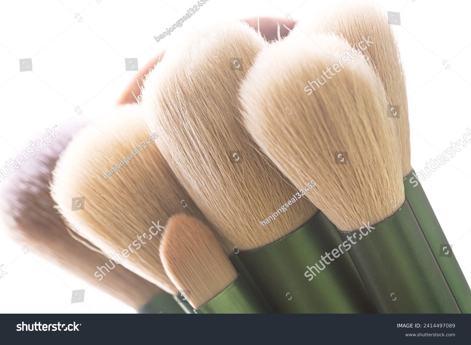 Macro bristles makeup brush,Brush tips in real-life color residue on bristles, isolated on white. #2414497089