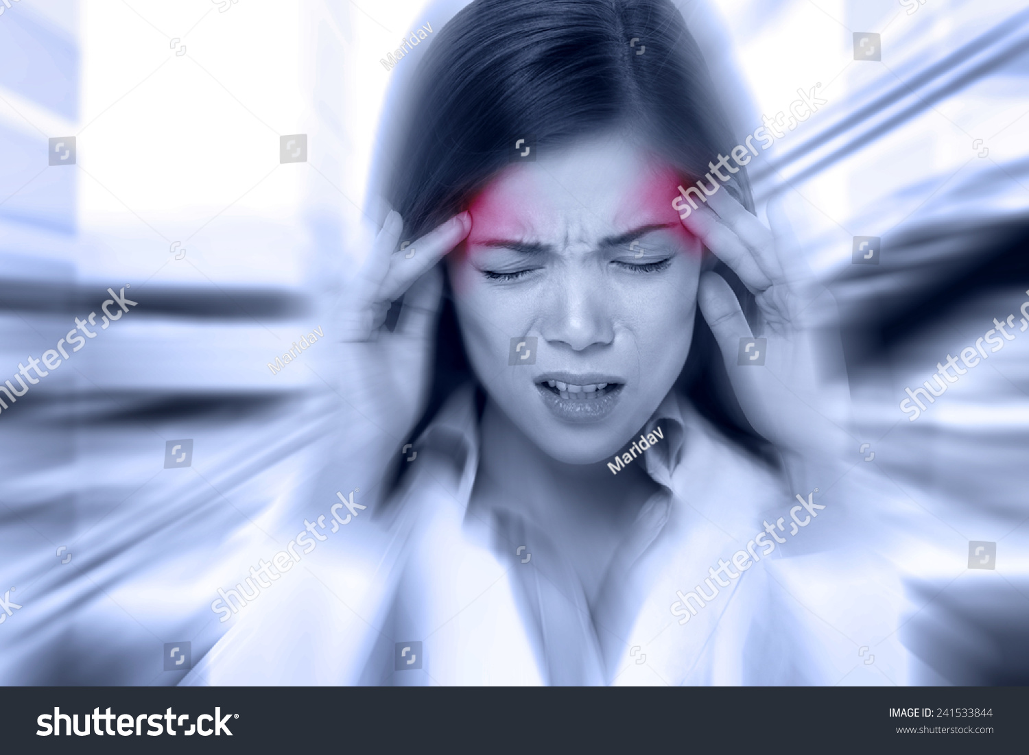 Headache migraine people - Doctor woman stressed. Woman Nurse / doctor with migraine headache overworked and stressed. Health care professional in lab coat wearing stethoscope at hospital. #241533844