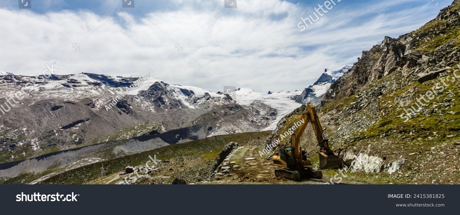Road construction in mountains, excavator in the mountains. #2415381825