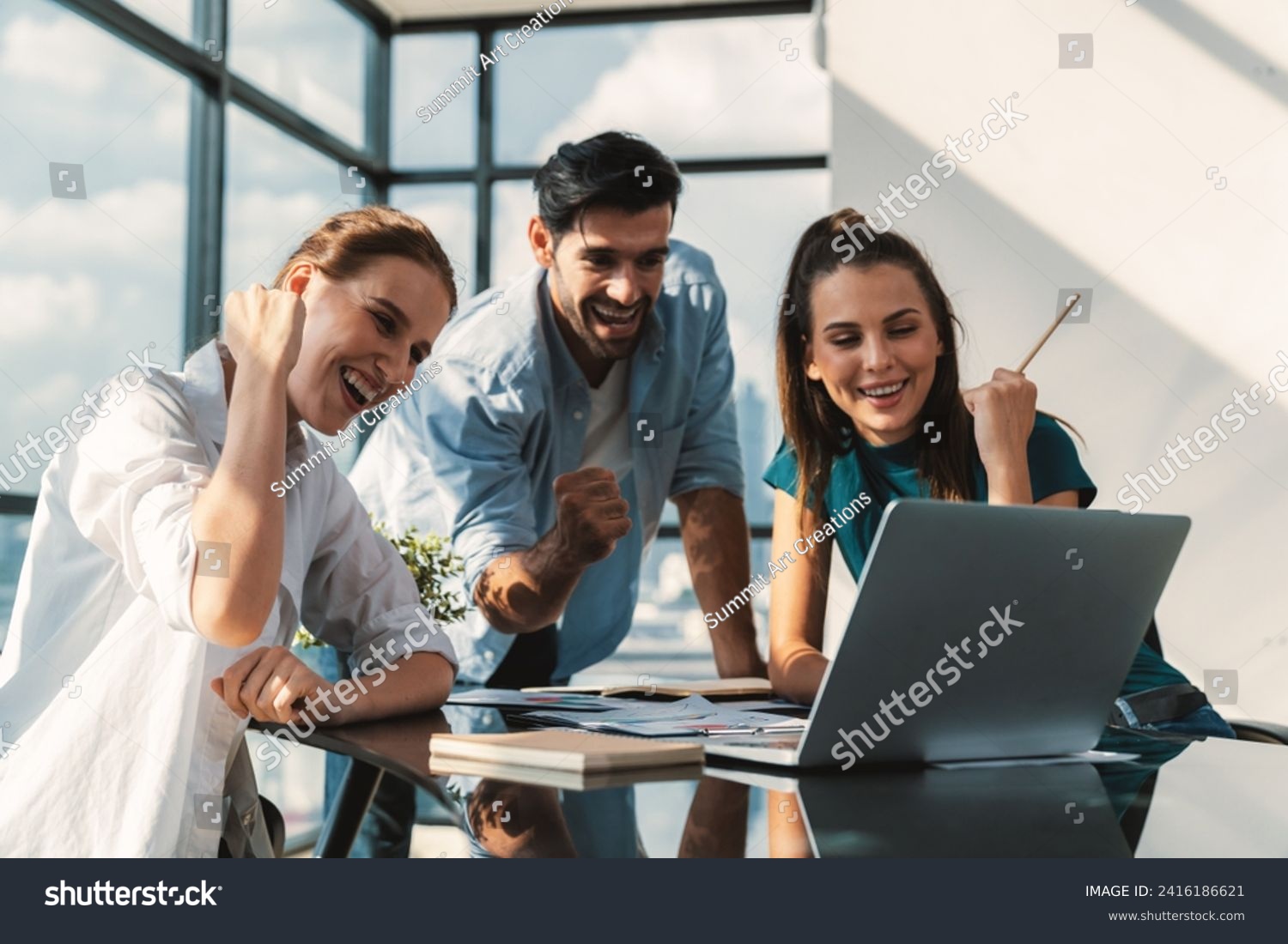 Group of happy businesspeople celebrate their successful project. Professional business team win and proud of their project at modern office. Successful teamwork, happy colleague, workplace. Tracery. #2416186621