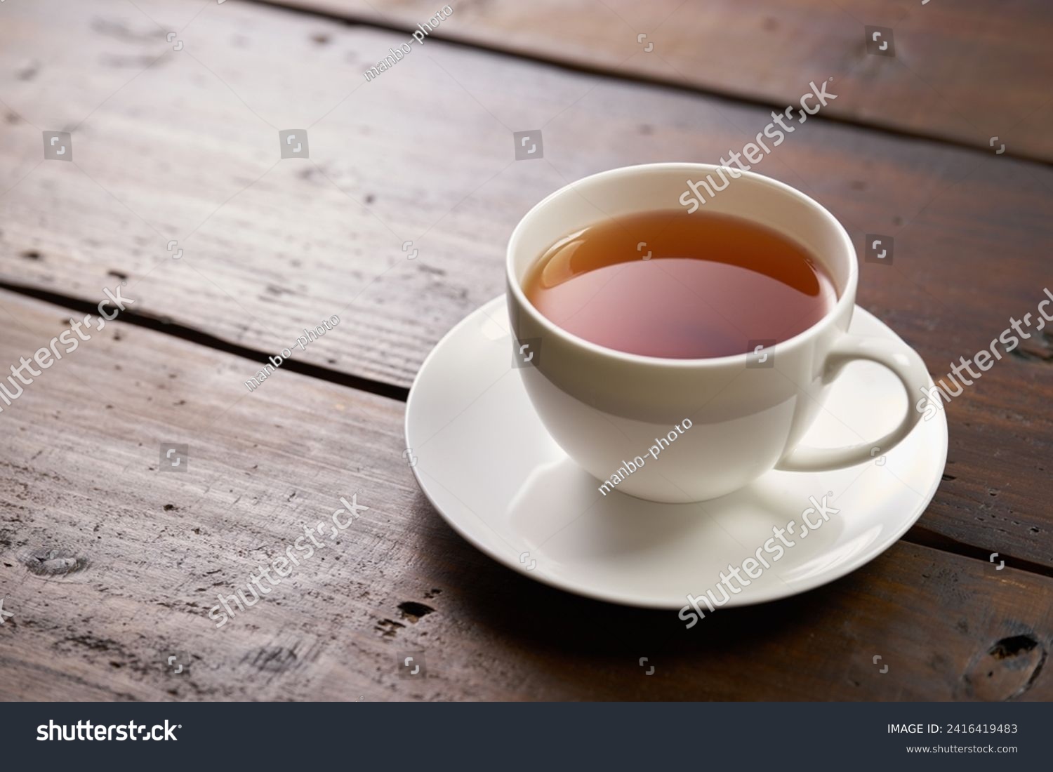 Image of drinking hot tea at tea time #2416419483