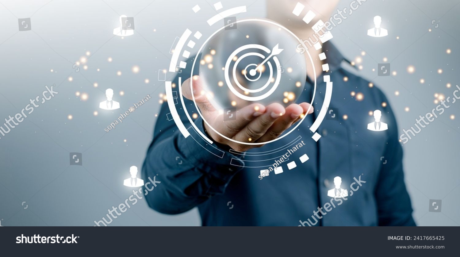 Target Achievement and Business Goals Digital Concept : Business professional presenting a target and goal achievement concept with digital holographic projection. #2417665425