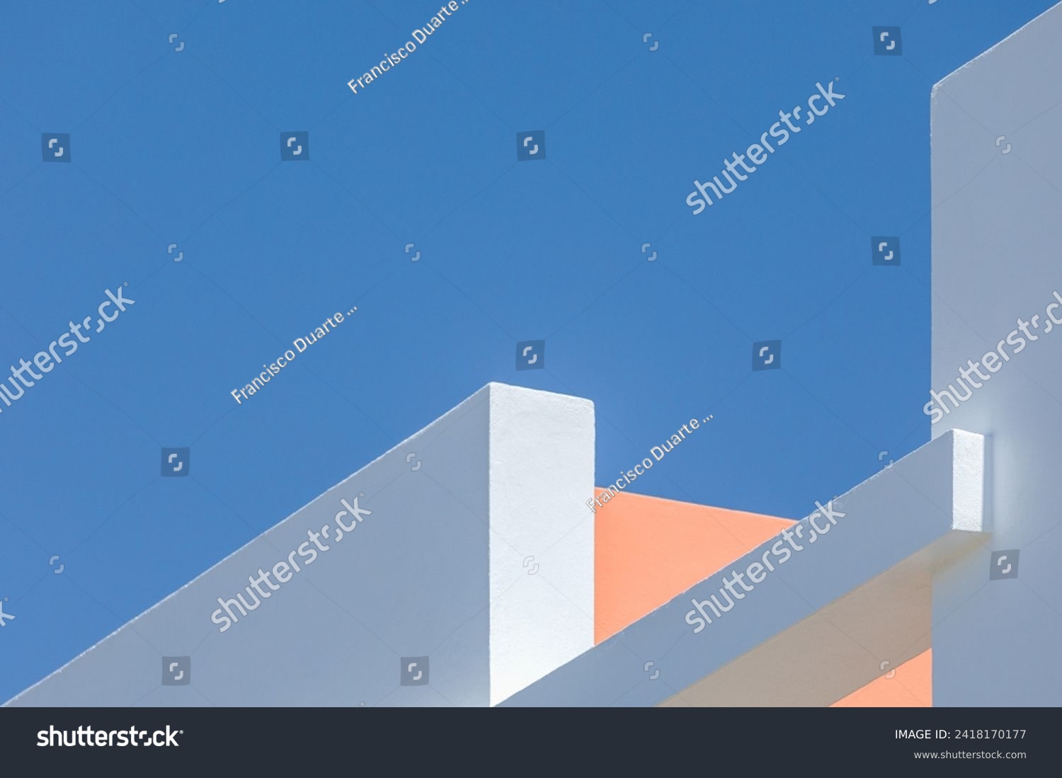 architectural photography. Abstract architecture background. Modern white concrete structure with straight lines and geometric shapes, against a blue sky. geometrical, linear design concept. Minimal #2418170177