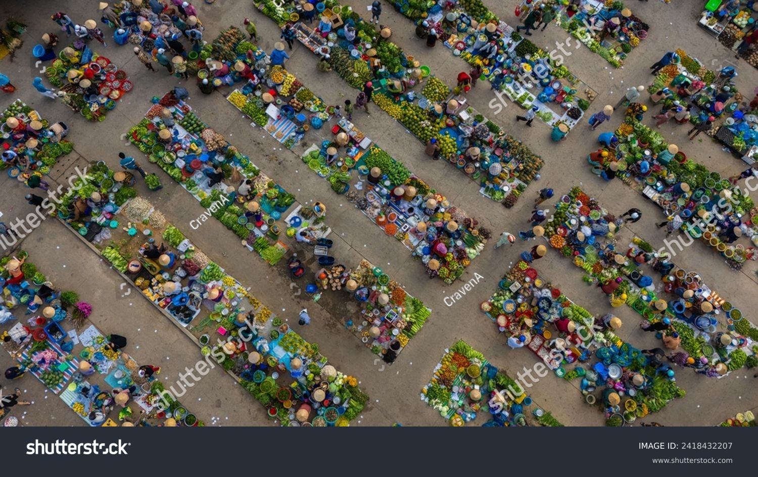 Aerial view of busy local daily life of the morning local market in Vi Thanh or Chom Hom market, Vietnam. People can seen exploring around the market. #2418432207