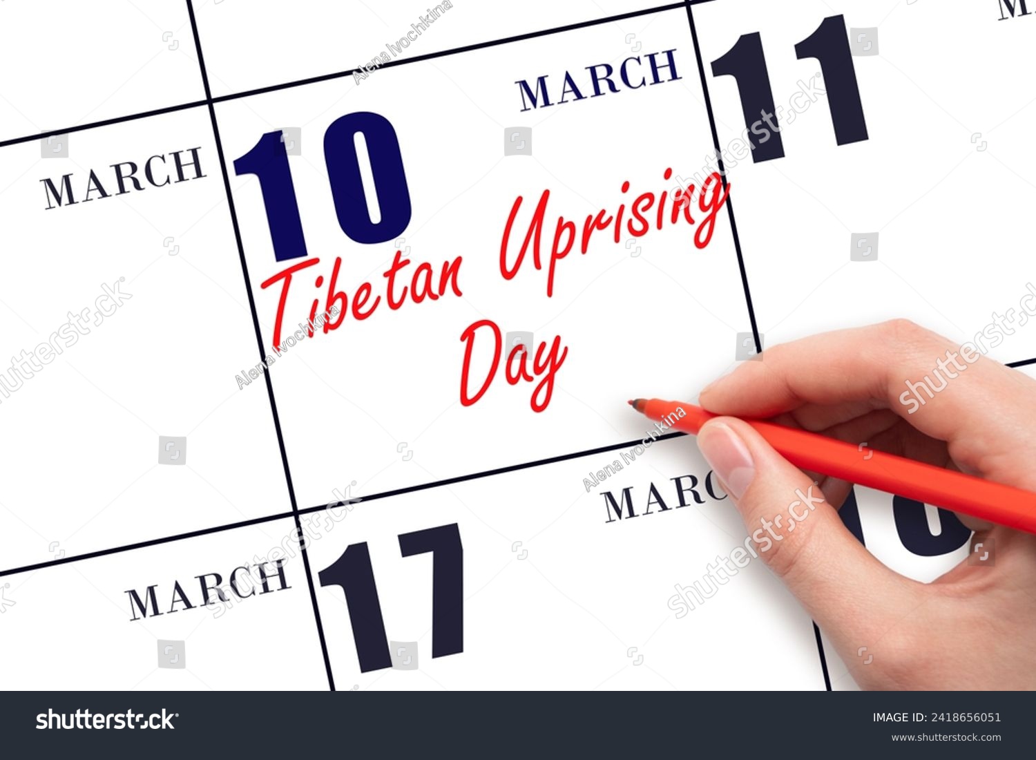 March 10. Hand writing text Tibetan Uprising Day on calendar date. Save the date. Holiday. Day of the year concept. #2418656051