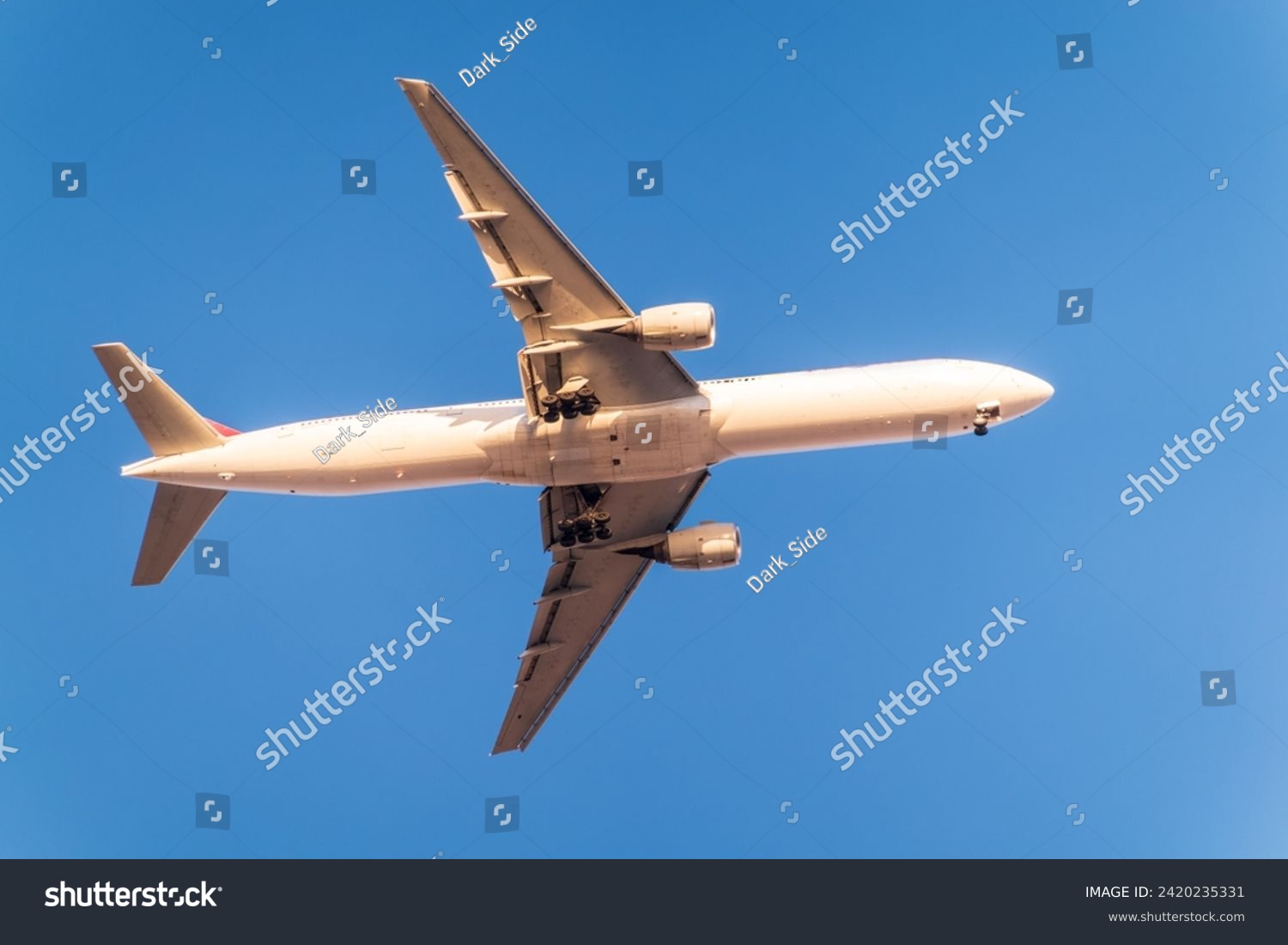 Airplane before landing in blue sky, Airbus A330. Air Transport. Tourism and travel concept. #2420235331