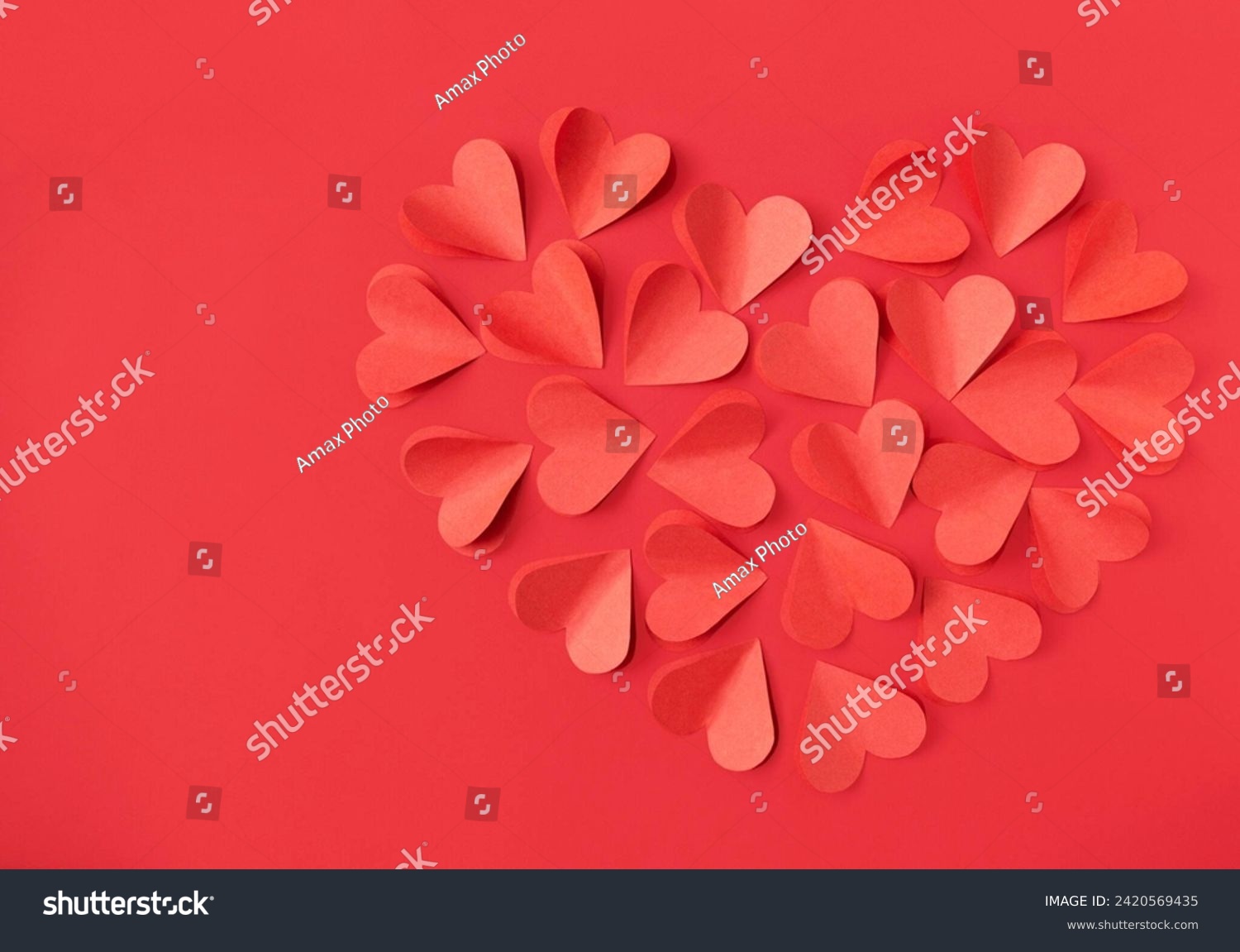 Valentine's Day background with red hearts on red background with copy space #2420569435