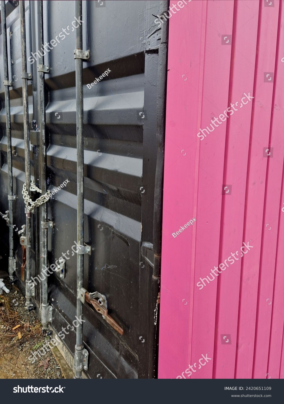 The black shipping container serves as a folded material. if refrigeration is supplied, it is a coffin warehouse with the dead in an uncontrollable epidemic crisis #2420651109